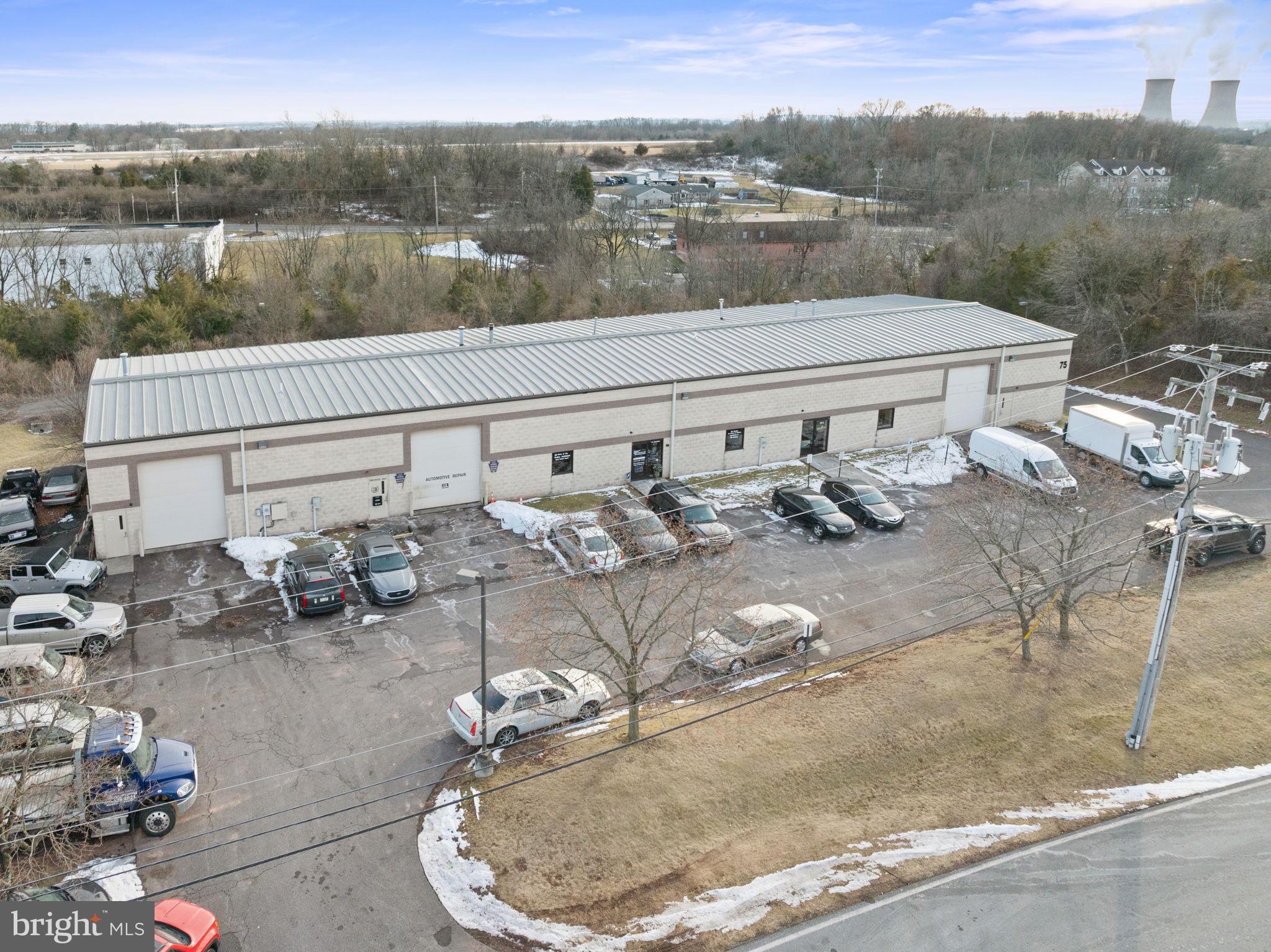 Here’s an excellent opportunity to own a well-maintained, fully rented industrial building in the highly sought-after Limerick Township. This 9,500 square-foot property offers quality space, making it an ideal investment or a future home for an end user. Conveniently located just off Ridge Pike, this complex offers plenty of private space and ample parking, with room for over 20 cars and 4 trailers. At just 25 years old, the building is in excellent condition. The property is currently fully occupied by long-term tenants. Unit A spans over 1,800 square feet of open industrial space with a large front loading dock. It connects directly to Unit B, which is just over 3,400 square feet, with a front loading dock and a full bay in the rear. Unit C offers more than 4,200 square feet of space, featuring a front desk area, convenient offices, a loading dock at the front, and bay access in the rear. This unit is also occupied by a long-term tenant on a year-to-year lease. The rear of the property includes additional parking and trailer space, providing even more flexibility for future use. With a solid structure and a prime location, this property offers tremendous potential—whether you're looking for a reliable investment or planning for long-term growth.