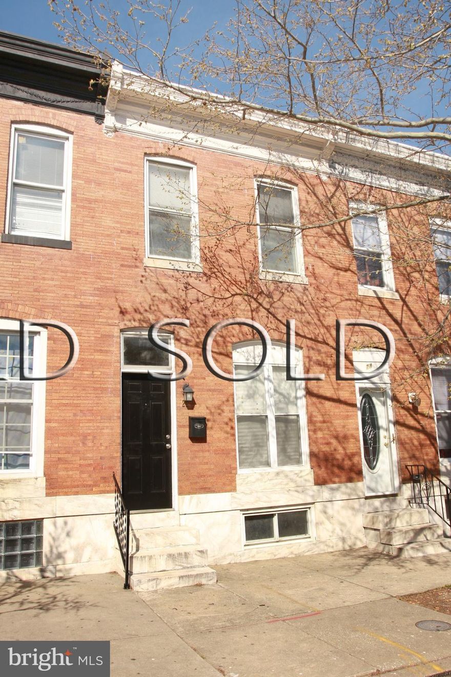 Investor alert! This handsome, 3BR, 1BA brick home is an awesome urban living value and is large at 1300+ sf! Off-street parking for TWO cars, HUGE open living/dining room, bright, spacious rooms and central AC, all just a few blocks from Patterson Park! The nine foot tall ceilings make this house feel incredibly airy, while the upper level is flooded with sunlight thanks to two large skylights. The ample master bedroom is large enough for easy furniture placement and makes a perfect and peaceful retreat. Nice-sized closets add utility, with even more storage in the basement. The low-maintenance yard and laminate floors are great for busy people. Front upper level windows replaced 2019, Roof resealed 2018, AC compressor replaced 2016, basement scraped and painted 2017. AS IS SALE; seller will make no repairs.