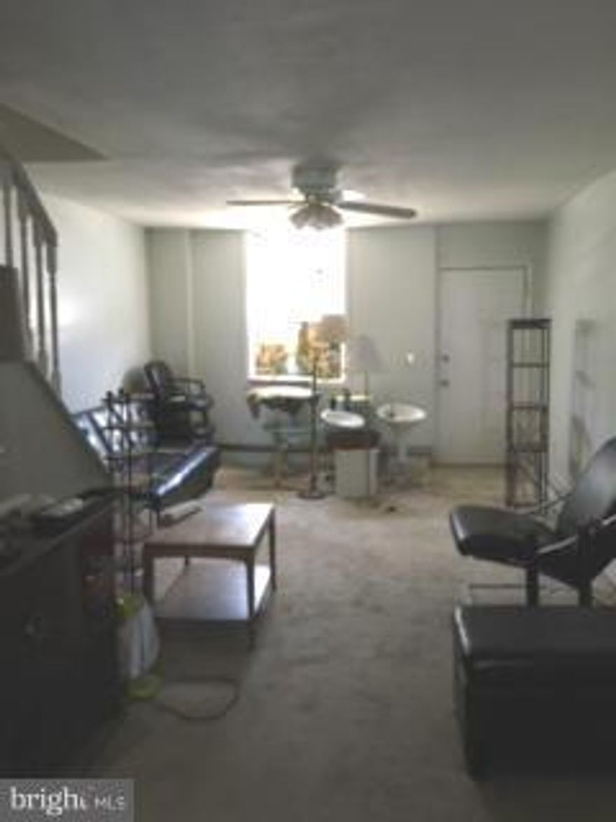 Estate Sale, Sold AS IS. Large 2 BR/ 2 BA End of Group row home is a prime rehab opportunity in Greektown. Property was once a 3 bedroom & could easily be converted back. Full unfinished basement with good ceiling height to finish out,  potential parking in rear, dual staircases in place for possible 2 unit, buyer to verify.