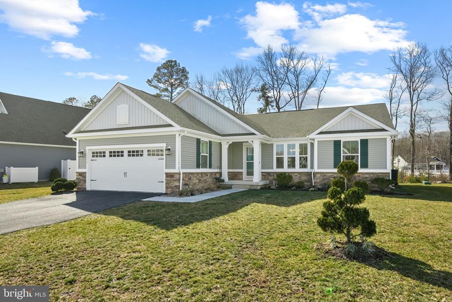 Welcome to this beautifully maintained three bedroom, two bath contemporary home located in the desirable Fox Haven community. With attractive stone accents and thoughtfully designed landscaping, this home offers charming curb appeal and a warm welcome from the moment you arrive.

Step inside to discover a bright and open floor plan that seamlessly connects the dining, living, and kitchen areas, creating an ideal layout for both everyday living and entertaining. Just off the entry, a convenient built in coat rack and cubby area provides a practical drop zone for shoes, coats, and accessories, while offering easy access through the laundry room to the kitchen and attached two car garage.

The dining area is enhanced with elegant crown molding, while luxury vinyl plank flooring flows throughout the main living areas and continues into the primary suite, adding both durability and style. The kitchen is beautifully appointed with granite countertops, soft close cabinetry, a stylish glass tile backsplash, stainless steel appliances, and a spacious island with pendant lighting and additional seating. A pantry provides extra storage and convenience.

The living room serves as a comfortable gathering space, highlighted by a cozy gas fireplace flanked by windows that fill the room with natural light. Just beyond, a bright and inviting sunroom offers the perfect spot to relax year round while enjoying peaceful backyard views.  Step outside to the paver stone patio, an ideal setting for outdoor dining, entertaining, or simply unwinding while overlooking the tree lined rear yard that provides privacy and a natural backdrop.

The primary suite is thoughtfully positioned to enjoy views of the backyard and features a spacious walk in closet and a well appointed en suite bath complete with an extra wide tiled shower with glass doors and a built in bench seat. On the opposite side of the home, two additional bedrooms and a full hall bath with a tub shower combination provide comfortable accommodations for family or guests. Additional storage is found with a coat closet and two linen closets.  This home is further enhanced by an irrigation system that helps maintain the lush lawn and landscaping. 

Residents of Fox Haven enjoy a variety of community amenities, including a clubhouse, swimming pools, boat and RV storage, scenic walking paths, low HOA fees, and low property taxes. All of this is complemented by a convenient location just a short drive from area beaches, shopping, dining, and popular coastal attractions.

This inviting home beautifully combines comfort, style, and location, offering an exceptional opportunity to embrace relaxed coastal living.

This one won’t last long—schedule your tour today!