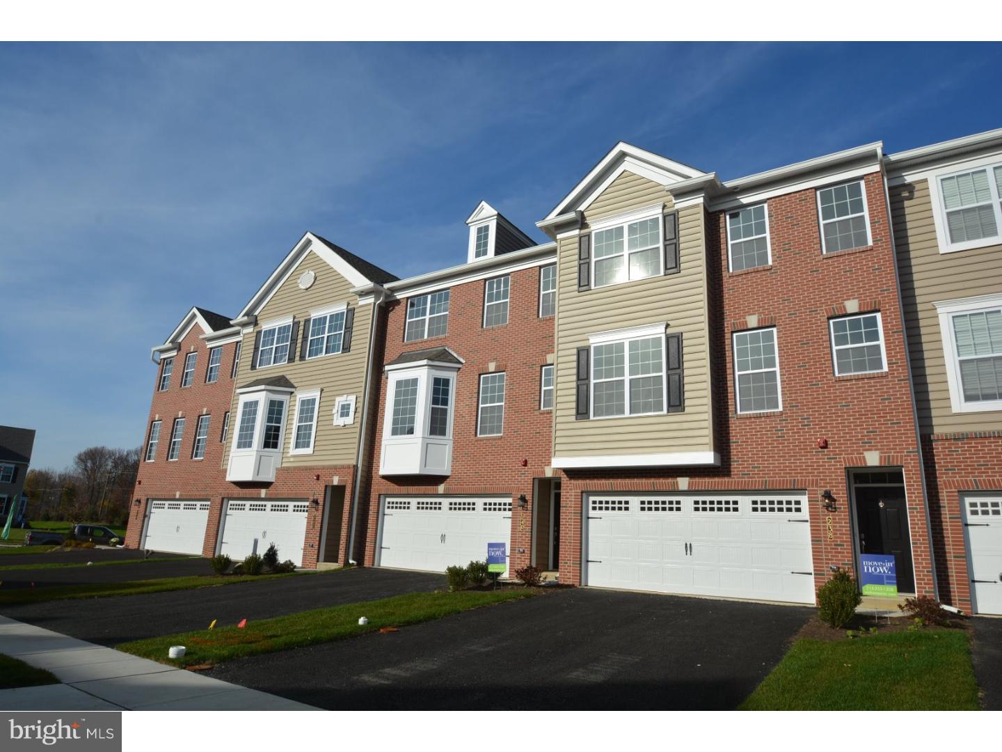 Red Bow Saving! This beautiful 3-story Ashford model at Saddlebrook Estates offers 3 bedrooms, 2.5 baths, and a 2 car garage. Entry into the hardwood foyer from the covered porch allows you to either continue on to the flex room and garage access, or move up to the main living level of the home. This spacious, terrace level flex room is filled with natural light and contains a glass slider to the back of your home, ideal for an entertainment area or relaxing getaway. Moving upstairs, you are met by the 9' ceilings that run throughout this level. The open floor concept of the Ashford makes the kitchen the highlight of the home, with it being centrally located, perfect for those who love to entertain. The first thing you will notice is the massive, stunning quartz island in front of you. After that, your eye will be drawn to the premium cabinetry, stainless steel appliance package, stainless steel sink, quartz countertops, and stone radiance backsplash. This dream kitchen continues with the addition of even more cabinet and counter space on the opposite side of the room. All of these wonderful features are emphasized by a premium lighting package that includes recessed fixtures, hanging pendants, and under cabinet lighting. This kitchen is sure to impress! An expansive great room with deck access and a sizable dining room only add to the overall elegance of this living level. This floor is completed by a closet and powder room. On the upper level, the master suite contains tray ceilings, a roomy walk-in closet, and a comfortable master bath. This master bath boasts features such as a glass enclosed shower with marble bench seat and tile surround, cathedral ceilings, designer tile flooring, a double bowl vanity, and espresso cabinetry. 2 additional bedrooms, another full bathroom with tile flooring, and a laundry room complete this level of your home. A custom paint package, "Bravo" lighting package, and brick accented front fa ade further add to the stylishness of this home. Saddlebrook Estates offers the convenience of low maintenance living with its inclusion of snow removal, trash services, lawn care, and landscaping maintenance. Further features such as professional landscaping, street-lit sidewalks, underground utilities, and access to travel routes makes Saddlebrook a convenient and enjoyable place to live. Price reflects $15,000 incentive! Only good through 12/31/15