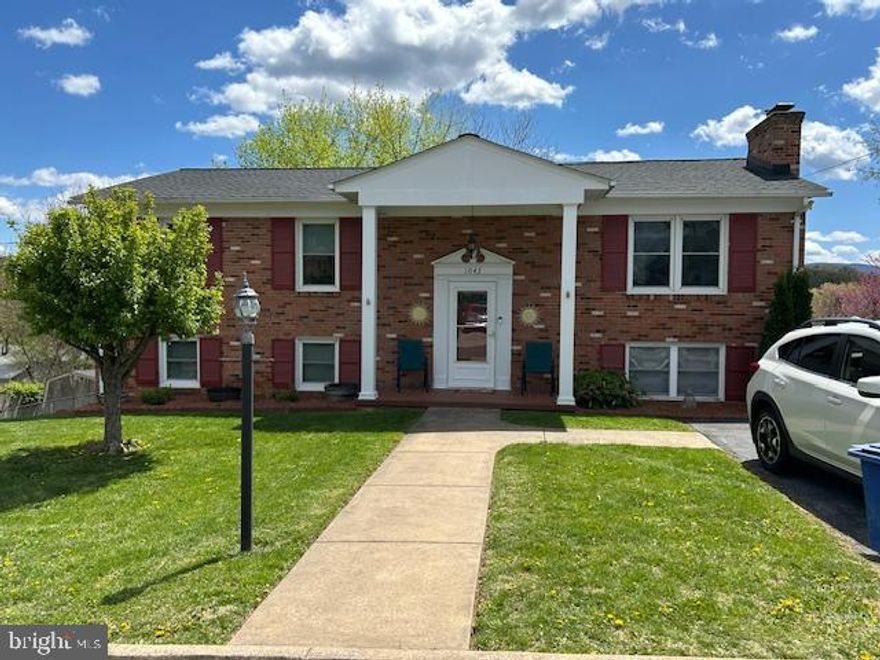 Timeless Elegance Meets Modern Comfort!
Nestled in a peaceful neighborhood, this stunning four-bedroom brick home exudes warmth and sophistication. With its classic exterior and inviting front porch, it welcomes you inside to a spacious, light-filled interior designed for both relaxation and entertaining.
The heart of the home is a beautifully appointed kitchen featuring sleek countertops, ample storage, and modern appliances. Flowing seamlessly into the open living and dining areas, it's perfect for hosting gatherings or enjoying quiet evenings. Fireplace has flue for a pellet stove. 
New patio doors installed 12/2024, new main level flooring 5/2024, new roof on home and shed 2020.
Outside, a lush backyard provides the ideal space for outdoor enjoyment, complete with rear decking for dining al fresco or simply soaking in the serene surroundings and mountain views. Fenced back yard and dual driveways for plenty of off-street parking. 
With its durable brick construction, thoughtful layout, and prime location, this home is an exceptional blend of style and functionality, ready to welcome you home.
