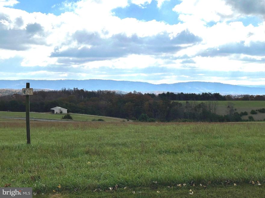 LOOKING FOR THE PERFECT BUILDING SITE?  NICE LEVEL BUILDING LOT CENTRALLY LOCATED BETWEEN KEYSER AND FORT ASHBY.  WELL ESTABLISHED SUBDIVISION. WONDERFUL MOUNTAIN AND PASTORIAL VISTAS CONVEY! SENSIBLE  COVENANTS TO PROTECT YOUR INVESTMENT. YEAR ROUND MAINTAINED ROADS. PUBLIC WATER WILL BE AVAILABLE SOON.  ROAD FRONTAGE ON 2 ROADS. GENTLY SLOPED TO LEVEL LOT. SEVERAL BUILDING SITES TO CHOOSE FROM. PRIVACY FOLLAGE IN REAR OF LOT.