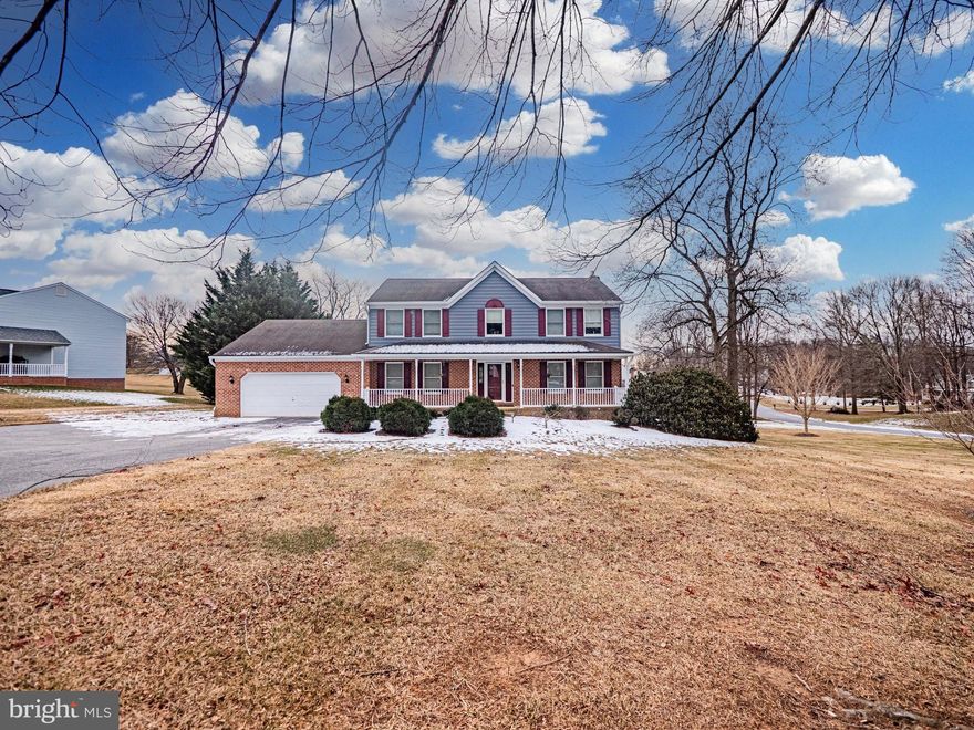 Welcome home to this beautifully maintained 4 Bdrm, 2.5 Colonial set on almost a one-acre lot.  The traditional first-floor family room off the kitchen is ideal for family meals or simple gatherings. This home offers classic charm with modern upgrades,  a spacious, oversized two-car garage, and a partially finished basement, perfect for extra living space, a home office or recreational area. This home has been thoughtfully updated for extraordinary energy efficiency. Recent upgrades include high-efficiency air handlers and Daikin High-Efficiency Hyper-Heat Pumps.  The average electric bill (last 3 months has only been $255.00 per month)! The new insulated siding, and the added 24 inches of attic insulation really makes such a difference in those electric bills. 
A top-of-the-line enhanced HW heater, which has an anode rod installed, will protect the longevity of the heater. The electric steam humidifier and the "pre-wiring" for a whole-house generator are just a few more upgrades. The new granite countertops show off the infrared cook top (which has a down-draft exhaust, installed!). The Miele dishwasher is there to stay, they have an extraordinary reputation for longevity.  
Stepping outside from those gleaming hardwood floors of the family room leads you to the sprawling maintenance free (approximately 57' X 16') deck is sure to extend your living space outdoors! Yes, the deck is the entire back of the house and garage! And the deck features a pre-installed gas line for your seamless fire pit set up- perfect for year-round enjoyment. What else could you ask for?