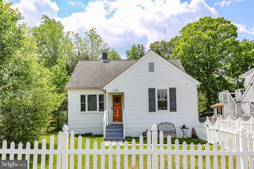 This charming Cape Cod home, built in 1951, offers a perfect blend of classic character and modern convenience. A thoughtfully designed space, this delightful residence features two cozy bedrooms and a full bathroom, making it an ideal retreat for those seeking comfort and simplicity. Step inside to discover beautiful hardwood and vinyl flooring that flows seamlessly throughout the home. The inviting kitchen is equipped with essential appliances, including an electric oven/range, microwave, refrigerator, washer, and dryer, ensuring that meal prep and laundry are a breeze. The living area is bathed in natural light, creating a warm atmosphere perfect for relaxation or entertaining. Enjoy your morning coffee on the charming porch, where you can take in the serene views of the lush trees that back the property, providing a sense of privacy and tranquility. The outdoor space is complemented by a convenient shed, perfect for storing gardening tools or outdoor equipment. The driveway offers ample parking, making it easy for guests to visit. Located in a peaceful setting. With no association fees or amenities to worry about, you can enjoy the freedom of homeownership without added costs. This property is ready to welcome you home! Located minutes from Downtown Fredericksburg and the VRE.