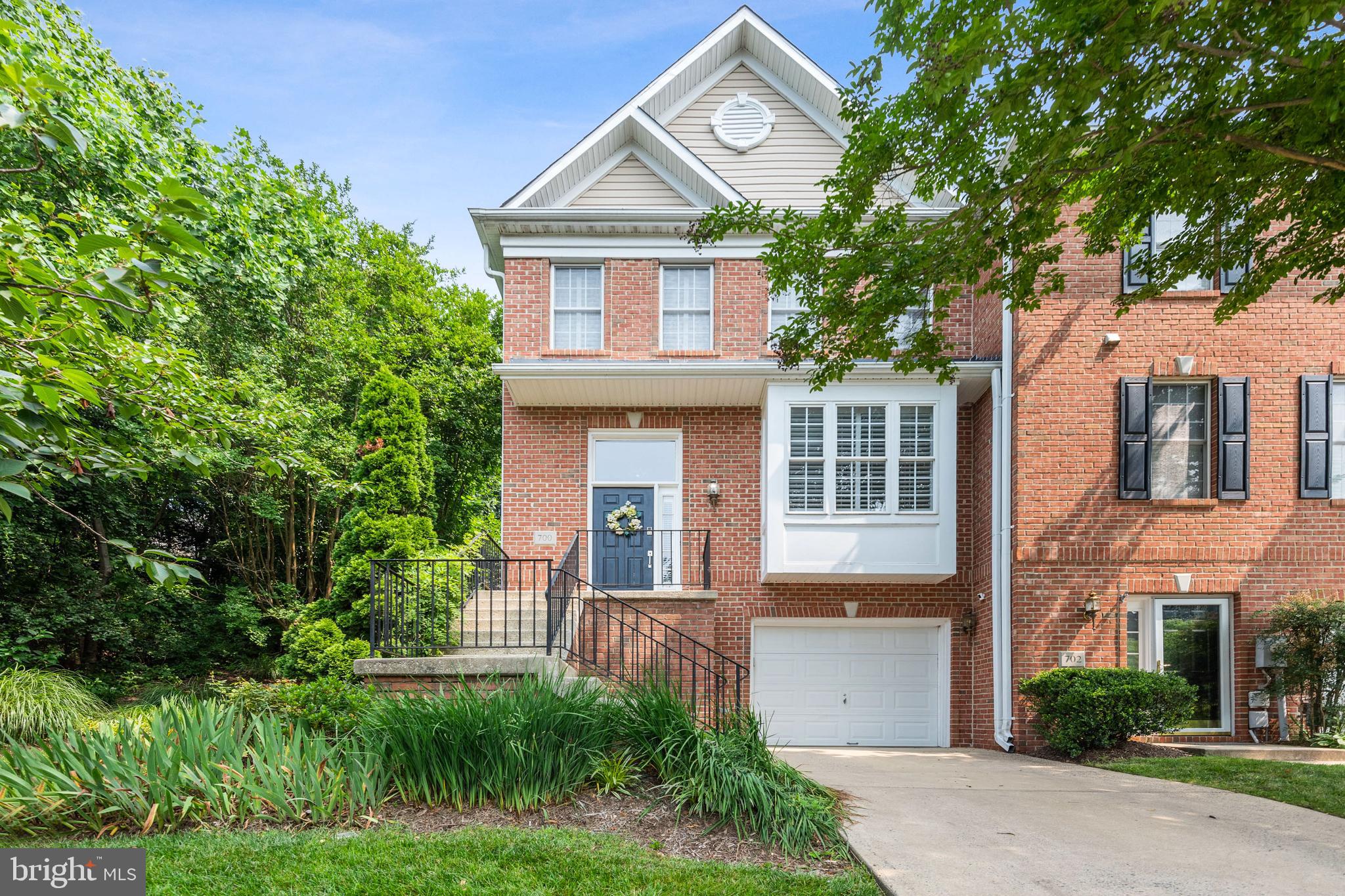Sought after gorgeous brick front end unit home with 2 private wrap around decks backing to a wooded area. Gleaming hardwood floors, tons of natural light with an open floor plan to include a breakfast room. Huge primary suite with vaulted ceiling and a luxurious super bath and custom walk in closets. Lower level has a bedroom with a full bath with a separate entrance and private deck.
Enjoy walking to your local restaurants, shopping and the new walking and biking trail!!!!. Quick access to all major highways for easy commute.
Available mid August.....There may be flexibility for move in for July.....
****Most of the house will have a fresh coat of paint prior to move in, to include ceilings on the main floor ****