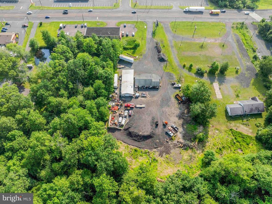 Commercial Opportunity Along Route 309 – 1.6 Acres with Existing Structures + Billboard Income
 
Highly visible ±1.60-acre commercial property located directly along Route 309 in Quakertown, Bucks County. The site includes two single-story buildings totaling approximately 3,212 square feet and offers significant frontage and exposure. Previously used as a day spa and an automotive workshop, the property is well-suited for contractors, service providers, retail, flex, or light industrial use.
 
The primary shop building measures 30’x60’ with 14-foot ceilings, a 10’x10’ roll-up door, and a 5-inch-thick concrete floor. The front 20 feet is built out as office space, with the remainder serving as open shop or storage area—ideal for tradesmen or business owners seeking a functional layout.
 
Additional value-add opportunity through passive rental income from the on-site billboard. Ample on-site parking and open yard space available.
 
Property Highlights:
±1.60 acres of commercially zoned land
±3,212 SF across two detached buildings
Shop building: 30’x60’, 14’ ceilings, 10’x10’ roll-up door
Built-out office area and durable 5” concrete floor
150 feet of frontage on Route 309
Billboard rental income included
Ideal for contractors, tradesmen, or investors
Convenient access to major routes and regional amenities
 
Property is being sold as-is. Buyer responsible for confirming permitted uses with the township.