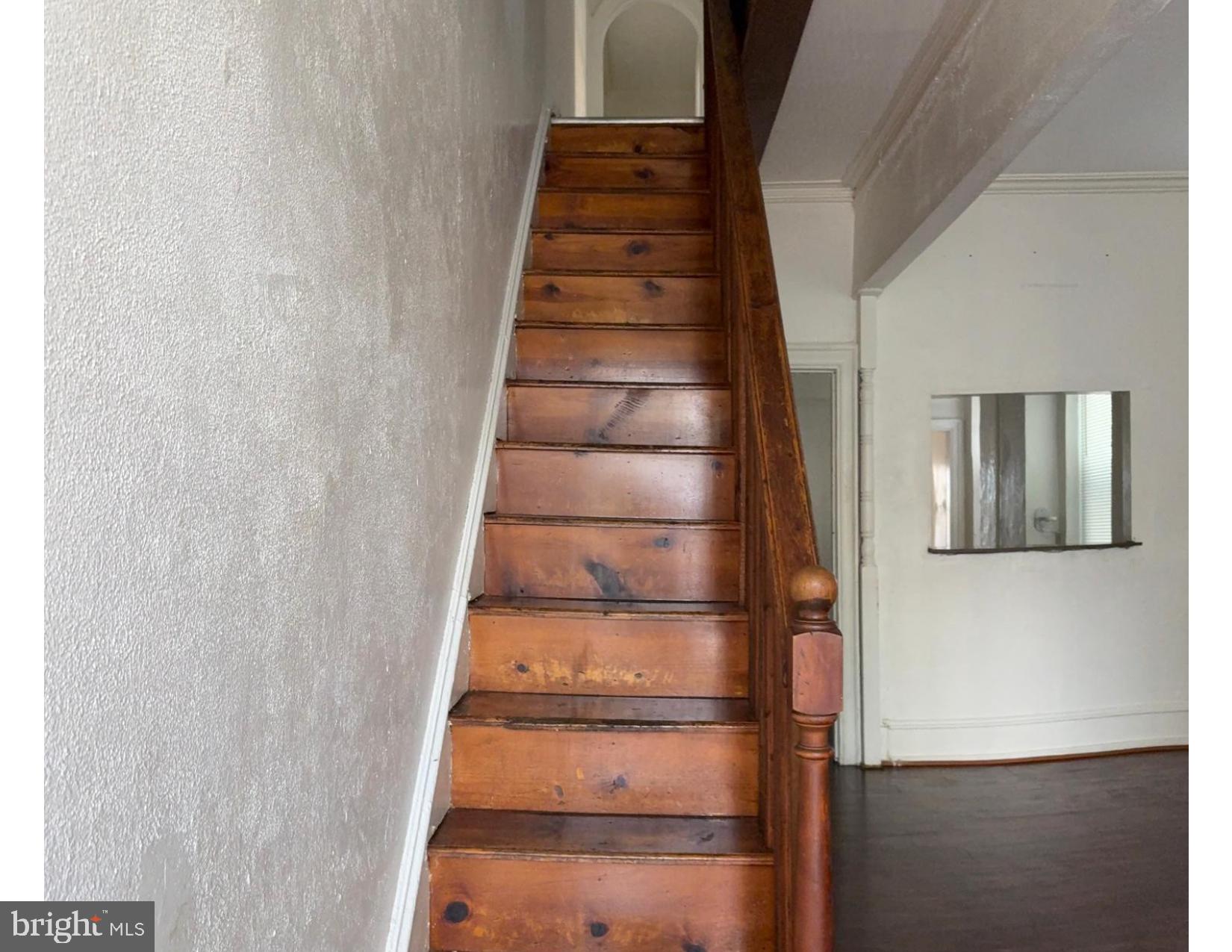Four Bedrooms row house 1-1/2 bathrooms - Partially updated - Nice size living room separated dining room area- Fenced Back Yard - close to public transportation, supermarket, Bank , post office -Unfinished basement with a lot potential - Half bathroom in the basement -