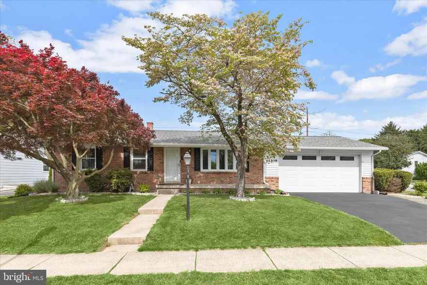 Welcome to 1309 Taney Avenue, a beautiful brick-front rancher in the heart of Frederick offering thoughtful updates, light-filled interiors, flexible living space, and no HOA. Situated on a desirable corner lot, this home features a fully fenced backyard with beautifully landscaped grounds designed for both relaxation and entertainment. Step inside to a bright and inviting living room highlighted by an expansive bay window that fills the space with natural light. The sunroom features vaulted ceilings, skylights, and serene backyard views, creating an open, airy atmosphere perfect for everyday living. The kitchen is well-appointed with stainless steel appliances, granite countertops, ample cabinetry, and a convenient breakfast bar for casual dining. The main level provides easy one-level living, offering three bedrooms and two full baths. The fully finished lower level expands your options with a spacious recreation room, an additional bedroom, a full bath, a second kitchen with granite countertops, a laundry room, and a versatile bonus room, ideal for a home office, gym, hobby space, or in-law suite. Outdoor living truly shines with extensive hardscaping, a patio, raised garden beds, a hot tub, and plenty of space to unwind or entertain within the fenced backyard. Additional highlights include an oversized two-car attached garage with a storage room and a separate two-car concrete driveway, perfect for an RV or additional parking. Recent updates include a 50-year roof (2022), refrigerator, dishwasher, washer, dryer, tile flooring, lower-level egress window, lower-level kitchen cabinetry and granite countertops, carpet, water heater, fence, a 28x32 side concrete driveway, and much more! Ideally located near shopping, dining, and major commuter routes, this home offers the perfect blend of comfort, functionality, and convenience.