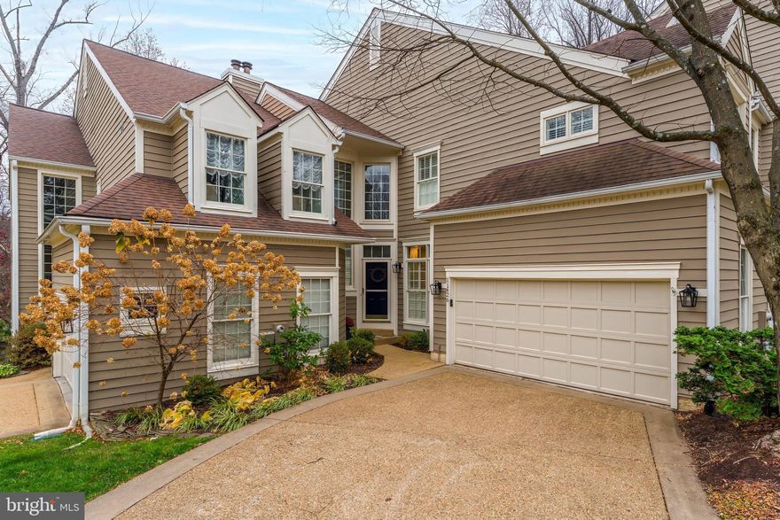 Join us on Friday, 2/20 from 5-7pm and Saturday, 2/21 from 2-4pm for an Open House.

Welcome home to Hollow Timber Court — An exceptional patio-style townhouse in one of North Reston’s most coveted neighborhoods. This beautifully maintained and decorated 3-level home offers an attached 2 car garage with direct, interior access and a walk-out lower level with full-size, above grade windows. It's the perfect blend of space, comfort and convenience with peaceful wooded views from the deck and patio!

The interior features elevated upgrades and tasteful designer finishes. Step inside to a dramatic 2-story foyer and living room featuring a stunning centerpiece fireplace and an impressive wall of windows that fill the home with natural light. The separate dining room and eat-in kitchen offer great flow for everyday living and easy entertaining.

Upstairs, you’ll find two bedrooms, including a spacious primary suite with an updated en-suite bath, inviting you to a relaxing retreat at the end of the day. The lower level adds even more flexibility with a full bedroom and a rec area — perfect for guests, a home office, or additional living space.

Enjoy all that Reston Association has to offer with access to walking paths, pools, tennis courts and more. Ideally located steps from North Point Village Shopping Center, you can easily walk to Starbucks, dining and the grocery store! Trader Joes, Reston Town Center, and Whole Foods are all a quick drive away. Commuting to Arlington or DC? You're minutes from Silver line Metro access at Reston Town Center and Wiehle Ave and ten minutes to Dulles International Airport. Zoned to Aldrin Elementary School. Welcome home!