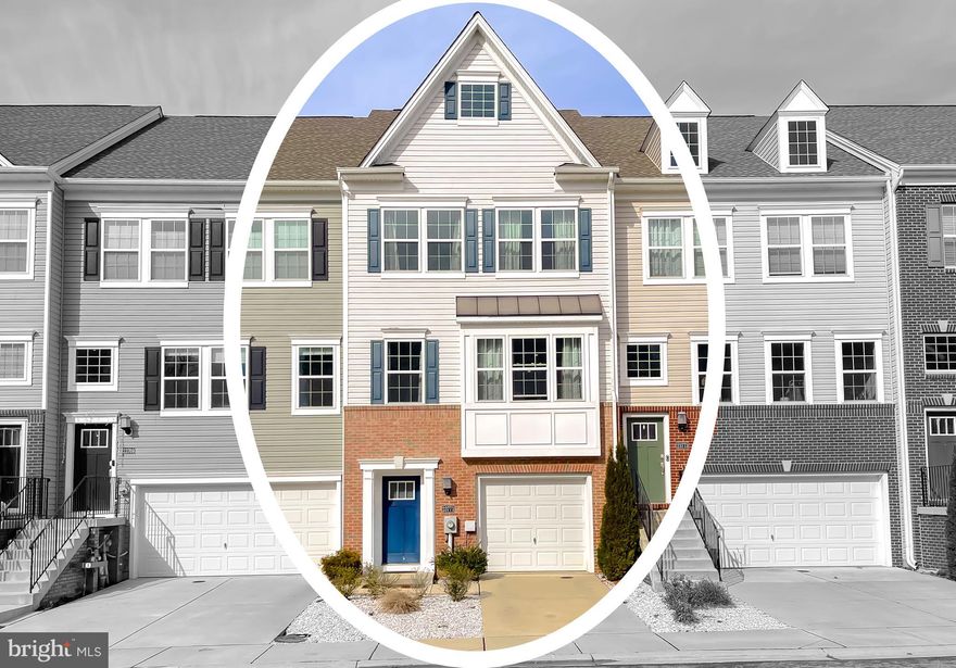 *Full home inspection performed and available to buyers upon request.* 

Step inside to an impressive open-concept living space, perfect for both entertaining and relaxing. 
On the main floor, a versatile room awaits—ideal as a private office or guest suite, complete with its own rear entry. 
Upstairs, soaring ceilings frame a chef-inspired kitchen that flows seamlessly into the family room, with access to a sunny deck and convenient half bath. 
The third floor offers a spacious primary retreat with ensuite bath, alongside two additional bedrooms and a full bathroom for family or guests. 

Located just minutes from PAX, shopping, and dining, this home also includes access to a sparkling community pool—bringing resort-style living right to your doorstep.