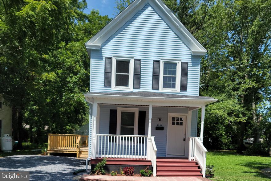 Price improved !!!! Welcome home to this adorable renovated home with 4 bedrooms and 2 baths. Open concept living with a great flow. All NEW  electric stainless kitchen , Samsung family sized fridge, and electric stove and oven. New wood flooring thru out. , A master on the main, full bath, closet, side private entry off deck. The seller kept some of the old world charm . Please wear booties or leave shoes at the door. You'll really love the new carpet so soft and cushiony!!!! Three more carpeted bedrooms up stairs and a spacious bath..
A new deck on side yard  for the grill. Two entries from  deck, one to master on main, the other, driveway  to deck side entry .
Driveway and front of house on street parking.