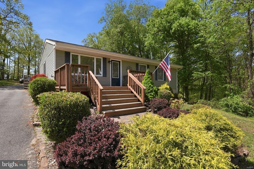 Welcome home to this beautifully updated rancher that blends comfort, space, and versatility. With five bedrooms and two full baths, this home offers room to grow, gather, and enjoy everyday living.
Step inside to find a bright and inviting main level featuring hardwood floors, a spacious living room, and a dining area perfect for entertaining. The gourmet kitchen is a standout, offering abundant cabinet space and granite countertops—ideal for both everyday meals and special occasions. Four well-sized bedrooms and a full bath complete the main level.
The finished lower level adds incredible flexibility, with a comfortable living space with a wet bar, a full bath, laundry and private bedroom featuring an egress window and walk-in closet —perfect for guests, extended family, or a recreation area.
This home has been thoughtfully maintained and upgraded over the years, including a new well with continuous flow pump, water softener, new septic system, and updated siding, roof, windows, and gutters with guards. Solar tubes bring in natural light, while a wood furnace provides an efficient heating option alongside the oil furnace backup.
Outside, you’ll find a spacious three-car detached garage with an attached carport—ideal for car enthusiasts, hobbyists, or extra storage. The property also features a fenced garden area ready for planting, a patio for outdoor relaxation, a wood shed, and an additional shed previously used as a chicken coop.
This is a home that truly has it all—schedule your showing today and see the possibilities for yourself!