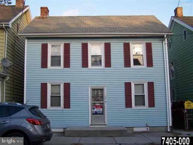 DETACHED INVESTMENT PROPERTY * NEWER VINYL SIDING * REPLACEMENT WINDOWS * SEPERATE ENTRANCES * WAREHOUSE/2 STORY 2 CAR GARAGE W/ PRIVATE PARKING LOT TO REAR OF UNITS * 1ST FLOOR LONG TERM TENANTS * 2ND FLOOR HAS BEEN RECENTLY REMODELED AND VERY NICE W/ LARGE ATTIC STORAGE.
