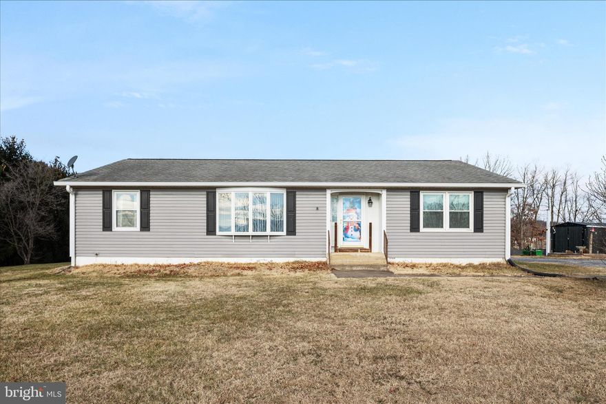 Well-maintained rancher on 3 unrestricted acres offering 1,820 sq ft of comfortable main-level living with an unfinished basement. This 3-bedroom, 2-full-bath home features numerous updates, including a 2-year-old HVAC system, new siding (2018), and a roof and windows replaced in 2008. Enjoy outdoor living on the side porch and rear Trex deck added in 2021.  It is approximately 15 minutes from Woodstock, North, and  Mt. Jackson, South, and I-81.

Other improvements include a new sump pump and drain pipe in the basement in 2025, accompanied by a transferable warranty. Additionally, the septic system was pumped and inspected on September 6, 2025, and an active maintenance agreement is in place with Enboden Environmental Service. Additional upgrades include a newer water heater and a concrete cellar door installed in 2017.

The property offers beautiful mountain views from the front, a private backyard backing onto trees (which extend beyond the property line), fruit trees, raised garden beds that will convey, and ample space for gardening or raising animals. Multiple outbuildings provide excellent storage, with one equipped with electricity. A rare opportunity for unrestricted acreage with extensive updates and peaceful surroundings.