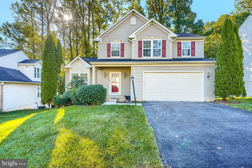 Welcome to this stunning single-family home with a two-car garage, located in the highly sought-after Chapel Hill School District. This spacious property offers 4 bedrooms and 2.5 baths, including a primary suite with a vaulted ceiling, perfect for comfort and relaxation.

Enjoy a bright sunroom and a private deck backing to trees, ideal for entertaining or enjoying quiet evenings at home. The main level features beautiful wood floors, and the home includes two gas fireplaces for added warmth and ambiance. The kitchen is equipped with stainless steel appliances.

The upper bedroom level has been freshly painted and features brand-new carpet, while the walkout basement offers extra space for recreation, storage, or a home office.

Tucked away for privacy yet conveniently located near Route 7 and all major highways, this home is just minutes from White Marsh Mall and a variety of shopping, dining, and entertainment options. Move-in ready and perfectly maintained — this home combines style, comfort, and convenience in one exceptional package.