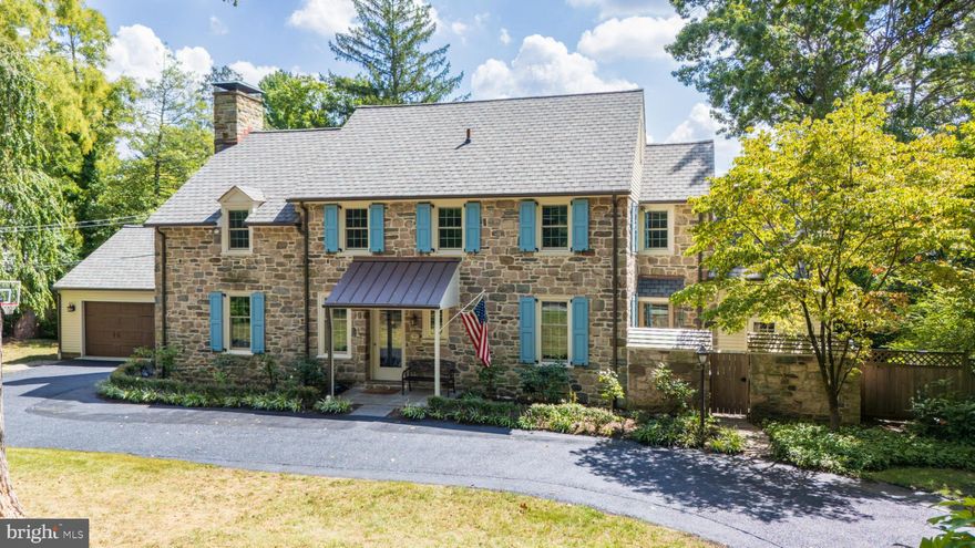 Welcome to 315 Caversham Road, where timeless elegance meets modern luxury! This enchanting center hall stone Colonial home radiates charm and meticulous care, perfectly nestled on a private cul-de-sac in the highly coveted Bryn Mawr neighborhood. Ideally located within walking distance to the Bryn Mawr train station, this property places you just moments away from an array of outstanding restaurants, upscale shopping, a vibrant weekend Farmers Market, the beautiful Ashbridge Park, as well as Bryn Mawr Hospital and Main Line Healthcare Offices—all within a mile! Situated in the esteemed Lower Merion School District, renowned for its exceptional public education, this residence is also in proximity to several prestigious private schools, including The Baldwin School, The Shipley School, The Haverford Boys School, Holy Child School, and the Barrack Academy. Set upon a meticulously landscaped half-acre lot, the property boasts specimen trees, a charming stone-walled vegetable garden, and lush, mature landscaping that creates an oasis of privacy and tranquility in the heart of a picturesque Lower Merion community. Initially constructed in 1941 and thoughtfully renovated in 2006, this exquisite Colonial residence masterfully intertwines classic charm with contemporary sophistication. The captivating stone exterior reflects timeless beauty, while the beautifully maintained interior invites you to indulge in a lifestyle of comfort and refinement.
As you step inside, a warm and welcoming atmosphere embraces you, highlighted by stunning, rich wood flooring that flows harmoniously throughout the home. A culinary enthusiast's dream, the spacious eat-in kitchen is equipped with high-end appliances, including a built-in range, double wall oven, and sleek refrigerator, all designed to elevate your culinary adventures. The cozy breakfast nook is perfect for savoring morning coffee or enjoying casual meals with cherished family and friends. The heart of this home is an elegantly designed living space that features a charming fireplace, serving as a focal point for gatherings and relaxation. Recessed lighting elevates the ambiance, creating a delightful sanctuary for both entertaining and unwinding. The convenience of a main floor laundry ensures that chores are seamlessly integrated into your routine. Retreat to the luxurious primary bath, where you can immerse yourself in a spa-like experience. Thoughtful touches, such as wine storage and ceiling fans, enhance the home’s allure, making it a perfect refuge for those who appreciate life’s finer pleasures. Outside, the property spans a generous 0.48 acres of level land, offering ample space for outdoor activities and gatherings. The attached front-entry garage and private driveway provide ease of access, while inviting patios and porches beckon you to bask in the serene surroundings. This residence is more than just a home; it embodies a lifestyle of enchantment and sophistication. With its exquisite blend of high-end features and thoughtful design, 315 Caversham Road presents a unique opportunity to embrace the very best of Bryn Mawr living. Experience the perfect harmony of luxury and comfort in this stunning property, where every detail has been meticulously curated for your enjoyment.