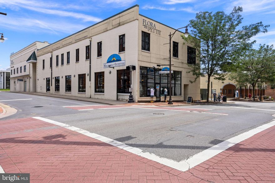 Fully leased, mixed use investment property in Downtown Harrisonburg with additional development potential at a  6.3% CAP rate based on current NOI.   Professional office, Boutique retail and Health/Wellness currently serve as a great tenant mix.  The addition of a high quality common area lobby helps provide a 1st class feel.  The new, long term, NNN leases, provide investment security.  In addition take advantage of the Federal Qualified Opportunity Zone and Harrisonburg’s Economic Revitalization Tax Credit by developing the vacant, attached lot. Vacant Lot:  .08 acre, B1 zoning: No minimum setbacks, parking requirements or lot size requirements. Up to 75 feet in height (taller via a special use permit).  Potential for a by right development of a 7 story, 28 unit apartment building subject to site plan approval.  Water meter in place, just needs a size upgrade.  Electric, Gas and Sewer on the premises.