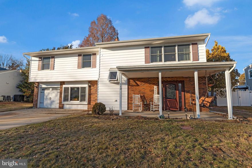 NEW PRICE!!  Opportunity knocks in desirable Fallsington!  Located in the sought-after Village of Nottingham, this beautifully maintained 5 Bedroom, 3 Bathroom home offers a perfect blend of charm, location and flexible living space! The main floor features a spacious Family Room with a cozy brick fireplace, brick accent wall and sliding glass door to the expansive, fenced in backyard! A well-appointed Kitchen features an abundance of granite counter space, 2 separate ovens, a breakfast bar and a large pantry – perfect for enjoying meals and entertaining guests. A charming Dining Room with large windows provides plenty of natural light and scenic views; and a Full Bath completes the main level.  Upstairs, beautiful Hardwood Floors welcome you into an awesome Family Room offering a spacious, relaxing retreat! The large Primary Bedroom includes its own en-suite Bath, and there are 4 additional generous-sized Bedrooms that share a Hall Bath. Enjoy the outdoors with a large, flat and fully fenced in backyard- ideal for seasonal enjoyment, gatherings, games or simply relaxing in your private space. With Laundry located on the 2nd Floor, a Storage/Utility Room, a 1-Car Garage and conveniently located close to local amenities, shopping, dining and major routes, this home is perfect for year round enjoyment! **Award-Winning Pennsbury School District** Schedule your appointment today!