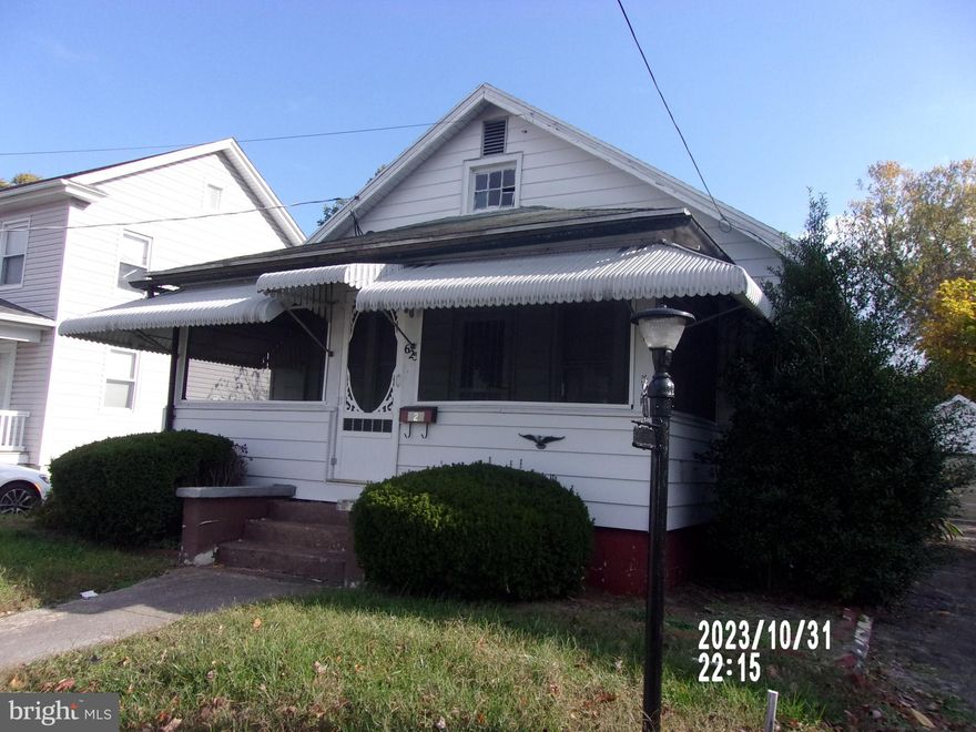 Single family home with detached garage fenced in yard close to retail shops and schools