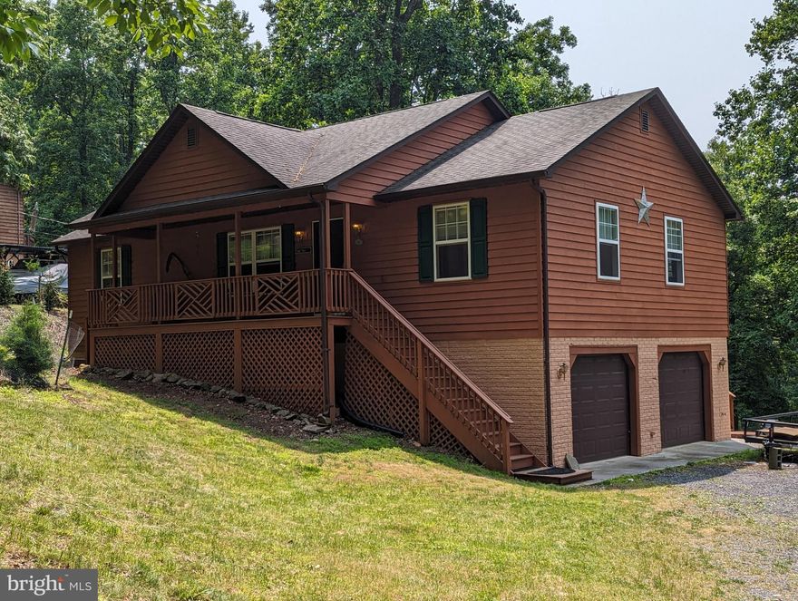 Welcome home to High Knob, a private gated community with resort-like features. Vaulted ceilings, three bedrooms and laundry room on the main level make this rancher feel custom and spacious complete with a cozy corner fireplace. Downstairs is fully finished with an extra full bathroom and living room. After a day at home or at work, enjoy the outdoors while exploring the various parks and Greenway Trails of Front Royal as well as the Leach Run Parkway, which features a bike lane and sidewalk. Enjoy the Town of Front Royal's seasonal parades, festivals and events. Bring the kayaks and canoes! Close to local restaurants, wineries, State and National parks/Forests with public river accesses, fishing and hunting opportunities. Welcome home to your mountain retreat!