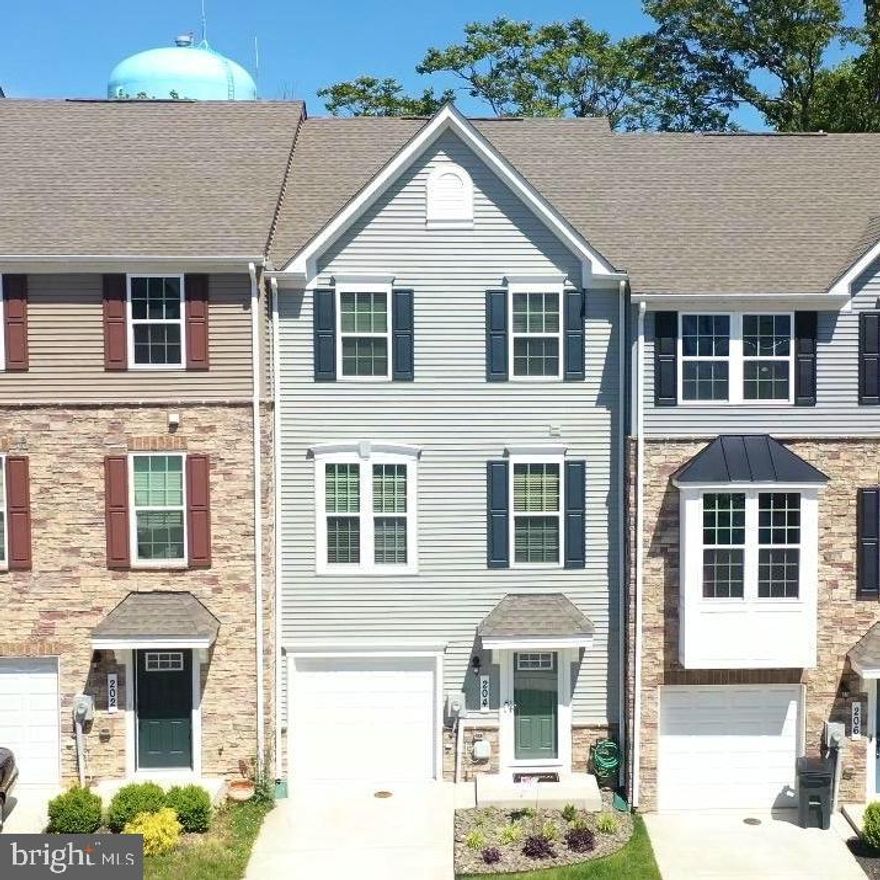 Nestled in the charming Anchor Point community in Indian Head, MD, this exquisite townhouse offers the perfect blend of modern comfort and timeless style. Built in 2021, this beautiful and EXCEPTIONALLY well maintained home features 1,720 square feet of thoughtfully designed living space, ideal for both everyday living and entertaining.

Step inside to discover an inviting open-concept floor plan filled with warmth, plenty of natural light with a natural flow. Plush carpeting, recessed lighting and contemporary finishes create a cozy, yet sophisticated atmosphere throughout the home. The heart of the home is the stunning kitchen, complete with a large and spacious center island, ENERGY STAR stainless steel appliances, built-in microwave, dishwasher, and high-efficiency refrigerator, this kitchen combines style and function. 

With three generously sized bedrooms and four bathrooms, including two full and two half baths, this home offers ample space for comfort and privacy. The serene primary suite provides the perfect retreat, while modern fixtures and thoughtful details enhance every room.

Additionally, the attached garage provides easy access for parking and ample storage, enhancing the overall functionality of the home. Outside, the low-maintenance exterior with vinyl siding, a fenced in backyard and a highly durable composite deck, the outside space definitely complements the inviting interior! Every detail has been carefully designed to deliver effortless living with modern appeal.

More than just a house, this is a place to truly call home. Experience the perfect balance of comfort, sophistication and convenience in one of Indian Head's most desirable communities. Don’t miss the opportunity to create lasting memories in this exceptional property!