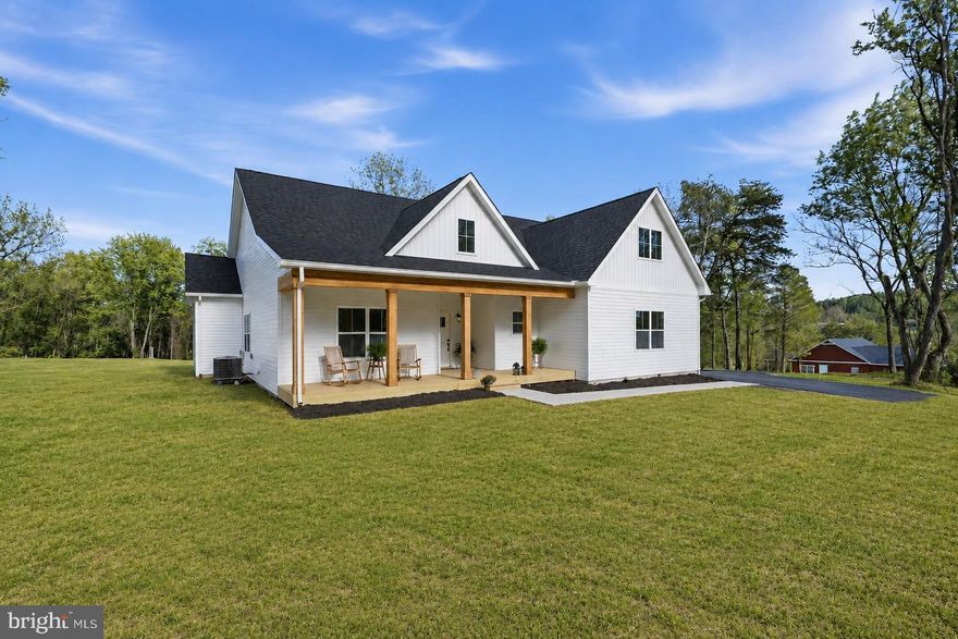 New Custom Home - Move-In Ready - Private Setting!
A beautifully upgraded 3-bedroom, 2.5-bath home on 2.44 acres. Offering modern features, quality craftsmanship, and a prime commuter-friendly location. This move-in-ready property showcases an open-concept floor plan designed for today’s lifestyle, with spacious living and dining areas that flow seamlessly into a stunning, upgraded kitchen.  The kitchen features quartz countertops, soft-close cabinetry, an extended island for additional seating and prep space, and a large walk-in pantry. Throughout the home, you’ll find solid wood doors and an upgraded trim package that adds a refined, custom feel. The primary suite offers a private retreat with a full bathroom and a walk-in closet.  Step outside to enjoy the exterior upgrades, including a convenient outdoor spigot with hot water (ideal for year-round use), a covered front porch, and a patio. 
Ideally located near Inwood and just minutes to Winchester, VA, this home offers easy access to major commuter routes, including Interstate 81 and U.S. Route 11. Enjoy nearby shopping and dining at Foxcroft Towne Center, grab essentials at Weis Markets, or explore outdoor recreation at the local park and along the scenic Shenandoah Valley.  Schedule your private tour today!
No HOA - the builder will consider revising the restrictions. Chickens and Horses allowed.