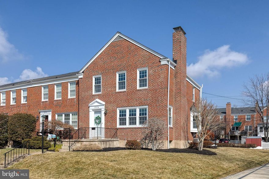 Exceptional Properties. Exceptional Clients. Off-Street Parking! Welcome to 1574 Glen Keith Blvd, an exceptional end-of-group home located in Loch Raven Manor. Impeccably maintained and thoughtfully updated, pride of ownership is evident from the moment you arrive. A charming vestibule entry opens to gleaming hardwood floors and abundant natural light throughout the main level. The spacious living room features a wood-burning fireplace, flowing seamlessly into the formal dining room and kitchen complete with stainless steel appliances and a cozy breakfast nook. Upstairs offers three generously sized bedrooms and a well-appointed full bath. The finished lower level expands the living space with a warm and inviting family room with custom built-ins, a second wood-burning fireplace, a full bath, and a laundry/storage area with convenient walk-out access to the backyard. Situated on a large, sun-filled corner lot, the exterior is equally impressive. Featuring a welcoming front porch, bluestone patio, Trex deck, and a new rear parking pad accommodating two vehicles. Extensive updates list in docs. A true turnkey opportunity, request your showing today