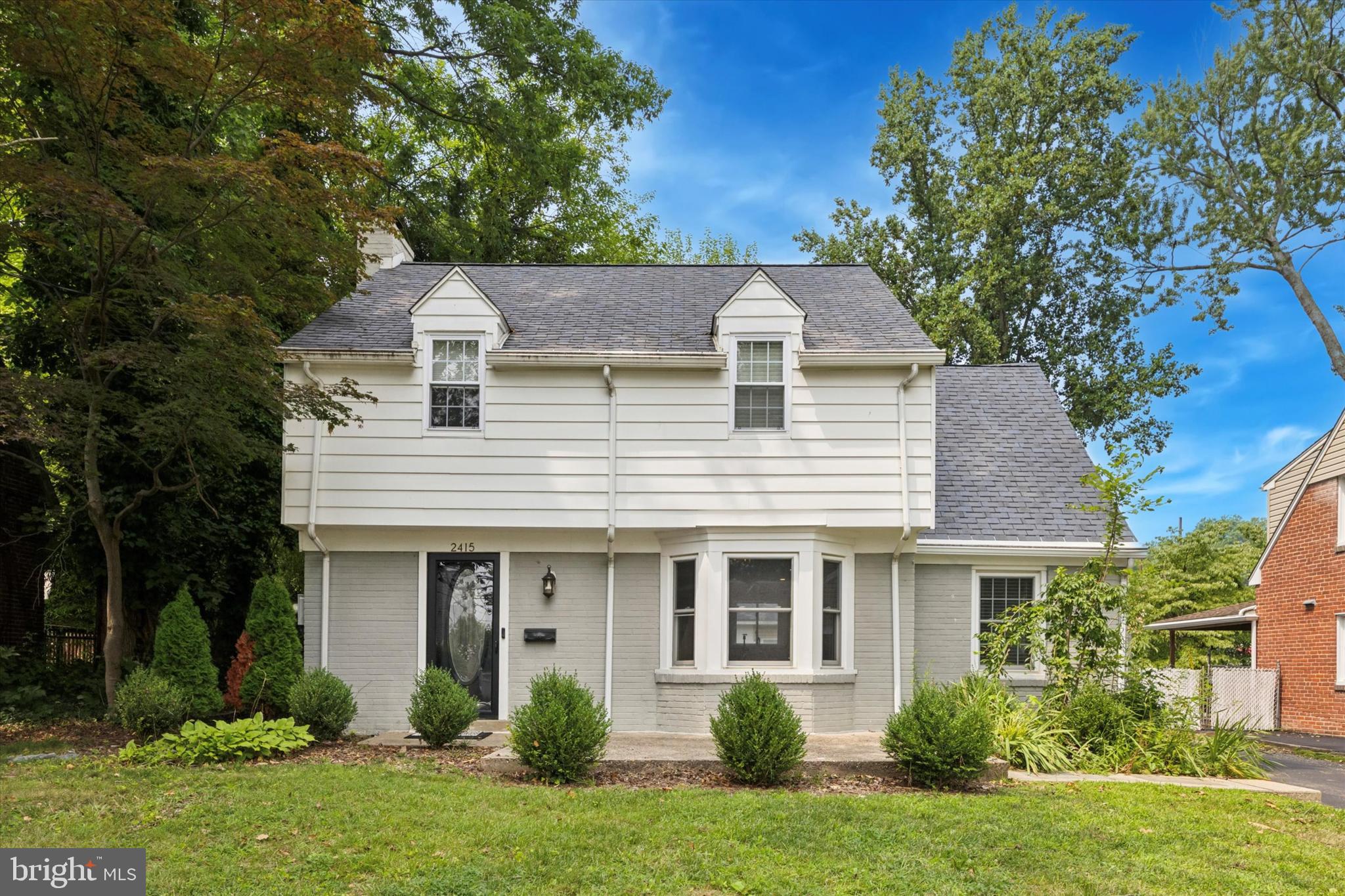 Lovely, updated Ridley Twp. Colonial in terrific sidewalk neighborhood! Spacious living room with fireplace & hardwood flooring. The open concept dining room & kitchen floor plan is the perfect space for anytime get togethers, everyday meals, holidays and special celebrations. The kitchen boasts white shaker cabinets, stainless steel appliances and beautiful granite countertops. There is a bedroom adjacent to the kitchen with an en suite full bath with a step-in shower. Mud room with laundry hook-up & exit to driveway & oversized detached garage plus a den/office with a walkout to the flagstone patio completes the 1st floor. The 2nd floor offers a Master bedroom with a large walk-in closet plus two additional nice sized bedrooms - all with ceiling fans. Updated hall bath with tub/shower. 2021 renovations include: new windows throughout, new HVAC, new water heater, 200 amp electric, hardwood flooring and more! Walk to nearby shops, restaurants, salons, playground & Septa Wawa/Media commuter train station.