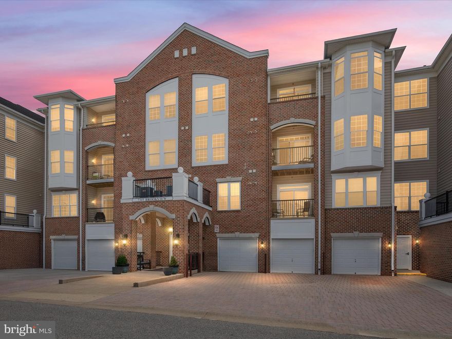 Owners have received multiple offers and are requesting highest and best offers by Tuesday 5/13 5pm please, thank you. 

Welcome to this beautifully maintained, sun-drenched 2-bedroom, 2-bathroom corner-unit condominium in the sought-after 55+ gated community of The Gatherings at Lyndwood in Elkridge. Enjoy easy, secure parking with your attached 1-car garage offering interior access to the building—plus a bonus parking space adjacent the garage for added convenience. 
(2 private parking spaces total, other public/guest parking is on-site) 

Step into a spacious, welcoming foyer featuring two coat closets, which opens to an expansive open-concept living and dining area, all accented by stunning tri-color hardwood flooring. The living space flows seamlessly into the sunny eat-in kitchen, accessible from both the living and dining rooms—perfect for entertaining. The kitchen is a standout, featuring stainless steel appliances, a convenient built-in desk/office nook, upgraded architectural cabinetry with rope crown molding, and elegant marble countertops. 

The generously sized primary suite, located just off the living room, offers breathtaking views of the Timbers at Troy golf course. This peaceful retreat boasts: two walk-in closets, a luxurious en-suite bathroom with dual-sink vanity, walk-in shower, and upgraded marble tile and counters. 

Adjacent to the primary suite, you’ll find a bright, well-proportioned den/sitting room filled with natural light and overlooking a serene pond—ideal for relaxing or reading.

The second bedroom, located on the opposite side of the unit for enhanced privacy, includes a spacious closet and is situated just steps from the second full bathroom—making it the perfect setup for guests. This bathroom mirrors the high-end finishes of the rest of the home with upgraded cabinetry, a full tub, and coordinating marble countertops.

This south-facing unit is bathed in natural light throughout the day and offers sweeping views of the beautifully manicured golf course.

The Gatherings at Lyndwood offers a lifestyle of ease, community, and luxury with meticulously maintained and landscaped grounds, a stunning clubhouse with gathering spaces, fitness center, game room, library room, outdoor pool, tennis courts, walking paths, and a full calendar of social events—from holiday potlucks to birthday celebrations—fostering a warm and vibrant community atmosphere