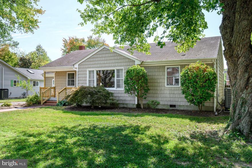 Built in 1959 and enhanced with a spacious primary suite addition in 1995, this 3–4 bedroom, 2-bath home provides generous living space and a versatile layout. The front covered porch leads into a bright living room with large windows overlooking the front yard.  Beautiful original hardwood floors carry throughout much of the home.  The open kitchen overlooks the dining area and sunroom. The home features a thoughtful split floor plan, with the guest bedrooms located in the right wing, including two bedrooms and a versatile flex room - ideal as a forth bedroom, home office or playroom. On the left side, the private primary suite addition includes a loft area, full bath, walk-in closet and sliding glass doors that open to the rear patio. Additional highlights include a mudroom with a laundry area featuring a laundry counter and built in cabinet storage.  Outside you’ll find a heated and cooled workshop, a spacious patio with a fire pit, a partially fenced rear yard with storage shed, a front blacktop driveway and rear alley access for additional off-street parking. Conveniently located just blocks from Idlewild Park, the Rails-to-Trails path and downtown Easton’s shops, restaurants and attractions.