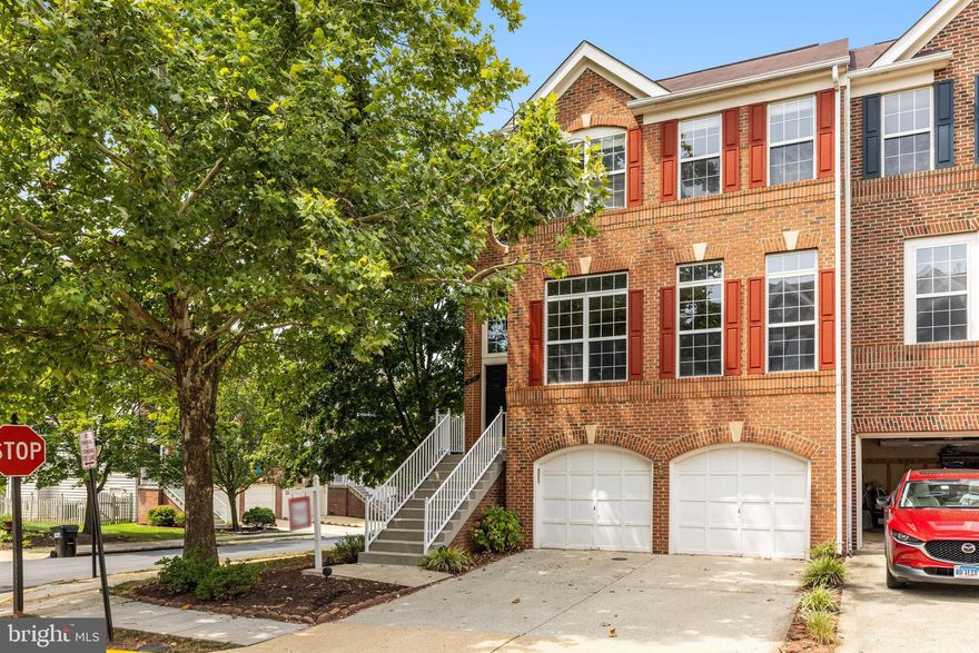 Move in Ready, Brick front, End unit TH in coveted Lakes of Red Rocks neighborhood!  New Paint. New Carpet. New light fixtures. All bathrooms have been upgraded. New ceiling fans. Deck and Fence stained.  Ducts recently cleaned. HVAC 2021 . HWH 2017.  Oak Hardwood floors on lower and main level. Under deck gutter system installed.  This home is the perfect balance of traditional and chic! Modern, warm neutrals throughout the  home with bold accents. All rooms are spacious and filled with natural light. Walk in closets for Primary and LL BR. Ceiling heights range from 9-12ft. Kitchen cabinetry expands into breakfast nook for tremendous storage. SS appliances, granite countertops and separate pantry. 2 level bump out. Extra large garage with additional space for trash cans, etc. Fully fenced yard with mature azaleas and arborvitae. Beds have been cleaned and prepped for you to add bulbs, veggies, whatever you prefer.  Close to extra guest parking and 1 block from community amenities. Absolute Must see home!