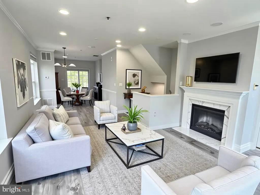 Enjoy this beautifully renovated, multi-level end-unit condo featuring two bedrooms and two full baths.
Meticulously updated with no expense spared, this stunning home showcases brand-new Calacatta countertops in both the kitchen and bathrooms, a reimagined fireplace, and luxurious vinyl flooring throughout. The kitchen is equipped with all-new stainless steel appliances, and the rare end-unit location offers an abundance of windows and natural light.
Located in a gated community with beautifully landscaped grounds, this home is just steps from the Metro rail, public transportation, shopping, and dining—making it a commuter’s dream.
Don’t miss your chance to own this exceptional property. It won’t last long!
