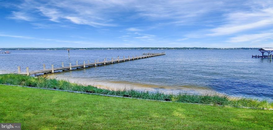 ONE OF A KIND 5.32 Acre Waterfront Property in sought after Half Pone Point Neighborhood.  Stunning Property is Secluded and has a Private Pond with Wildlife Galore.  Gorgeous Beach and Long Pier overlook the Patuxent River.   5.32 Property is divided up into Three (3) Lots, which all Convey.  The Charming Brick Home on the Property was built in 1958 and can either be renovated or knocked down to build your Dream Home.  This Property is Magical.