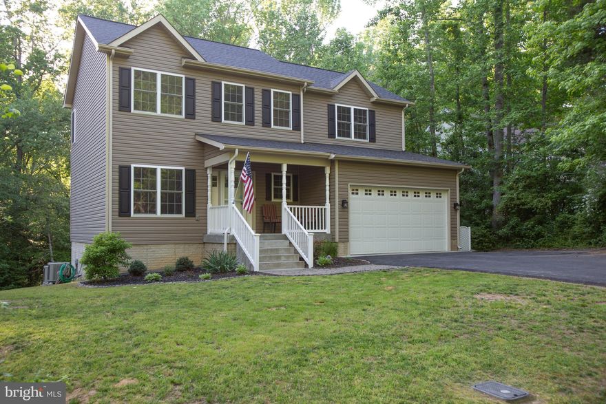 NEW PRICE REDUCTION!!!   Nestled among the woods is this immaculate, like new home. All of the upgrades have been done for you. Kitchen includes quartz counters, stainless steel appliances, backsplash, and tile floors.  Family room with cozy fireplace for those relaxing evening.  Home includes an eat in kitchen in addition to the formal living room and dining room.  Four generous sized bedrooms and two full baths on the upper level.  New in 2018 is an oversized TREX deck with aluminum rails. Basement is a walk out with plenty of room to add your own touches. Driveway is black topped and big enough for several cars. Lot is over a half acre and very private and wooded. And there's more!!  Enjoy all the amenities that Presidential Lakes has to offer. which include an outdoor pool, lake with private beach, tot lots, basketball courts and more. You will not want to miss this home.  Please call LA before showing