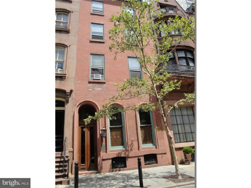 FOR RENT: Large 1 bedroom/1 bath home in the heart of the Rittenhouse Square area. Available immediately. This 3rd floor rear, brownstone apartment features a full open kitchen, living room and bedroom with hardwood floors throughout. Skylight in the living room. A large private deck access from the bedroom with stunning city skyline views. Coin-op washer/dryer in the building -- just across the unit. No pets, please. No smokers, please. TENANT REQUIREMENTS: 1st month's rent, last month's rent, and one month security deposit to be paid at time of lease signing; minimum of average credit score for all adult applicants.