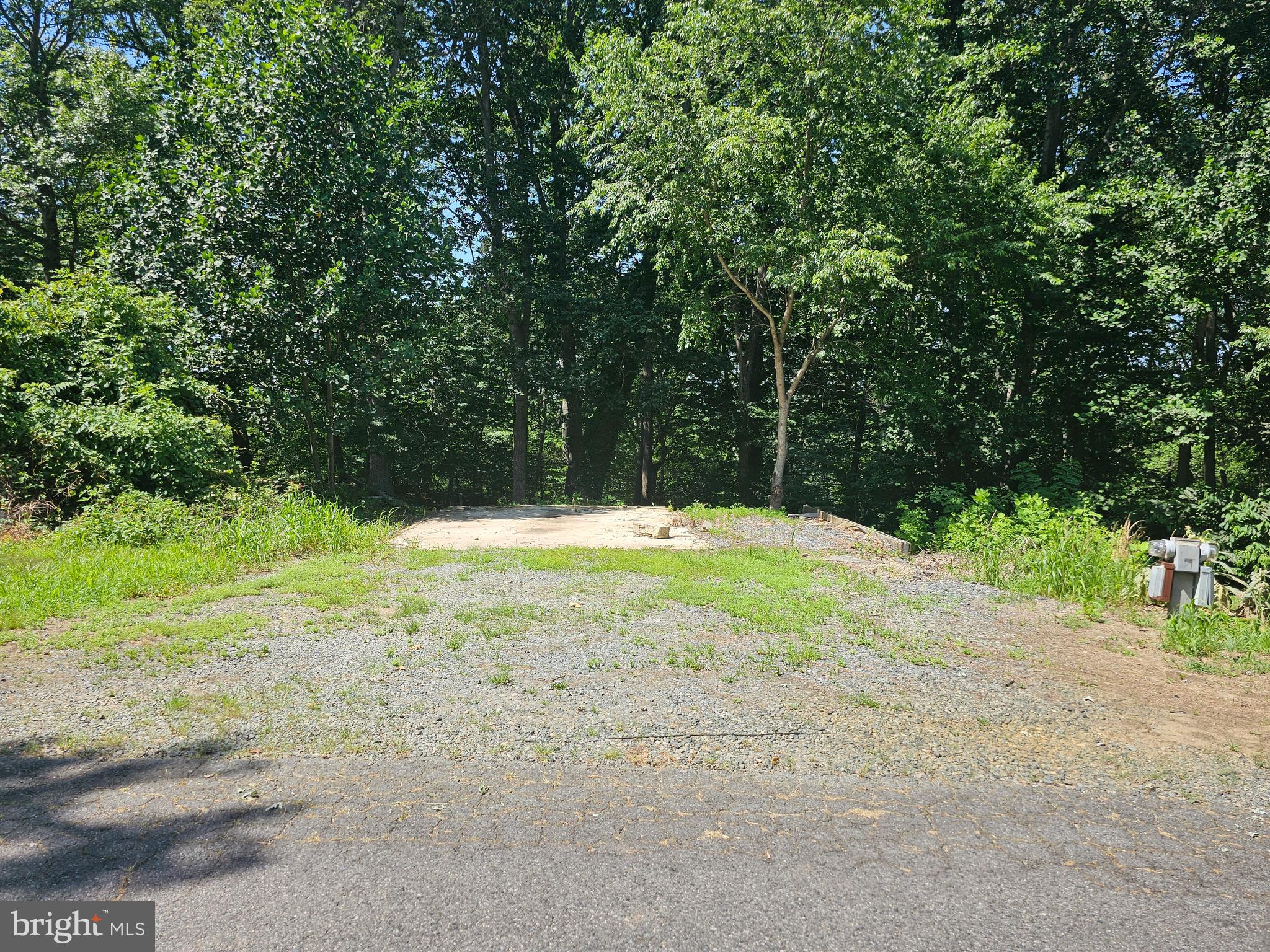 LOT BACKS TO TREES AND DISTANT WATER VIEW. LOCATED IN INDIAN ACRES CAMPGROUND AND OPEN YEAR ROUND. LIMITED TO 150 DAYS A YEAR NO MORE THAN 100 CONSECUTIVE DAYS. ENJOY THE POOLS, BOAT RAMP, PONDS, LAKE, AND SO MUCH MORE AT YOUR FUNCATION LOCATION. MUST BECOME A MEMBER TO PURCHASE.