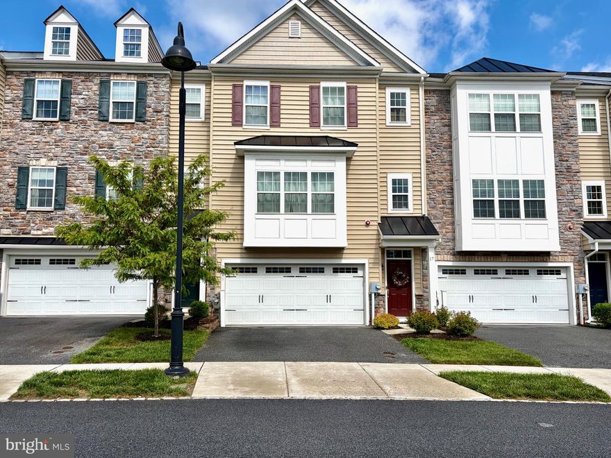 Welcome to 17 Skylar Circle, a beautifully appointed 3-bedroom, 2 full and 2 half-bath townhouse located in The Reserve at Rose Tree, just minutes from Media Boro and the Promenade at Granite Run. Located in the award winning Rose Tree Media School District.  This Larchmont model townhouse of Lennar Homes is a newer construction property, less than 8 years old, offering living space on three full floors.  Entryway leads to a large, bright and open concept living room and kitchen with rich hardwood flooring and recessed lighting. The kitchen features a large center island, stainless steel appliances and access to the trex deck overlooking greenspace for a serene and private feel.  The kitchen opens into a spacious living room with a gas fireplace accent wall and ample natural light from a wall of windows.  This level also features a dedicated dining space as well as a half bathroom.  Up one level is an oversized primary bedroom with vaulted ceilings, dual walk-in closets and an en-suite bathroom with double sinks and a floor to ceiling tiled shower.  Two more spacious bedrooms, a full bathroom and a laundry area round out this floor.  The lower level features a large family room with neutral carpets and recessed lighting as well as an additional powder room, storage area and interior access to the two car garage.  The Reserve at Rose Tree features a Community playground, soccer field, walking trails and a gazebo and is conveniently located near shopping, dining and major routes.  Don’t miss the opportunity to make this exceptional townhome yours!