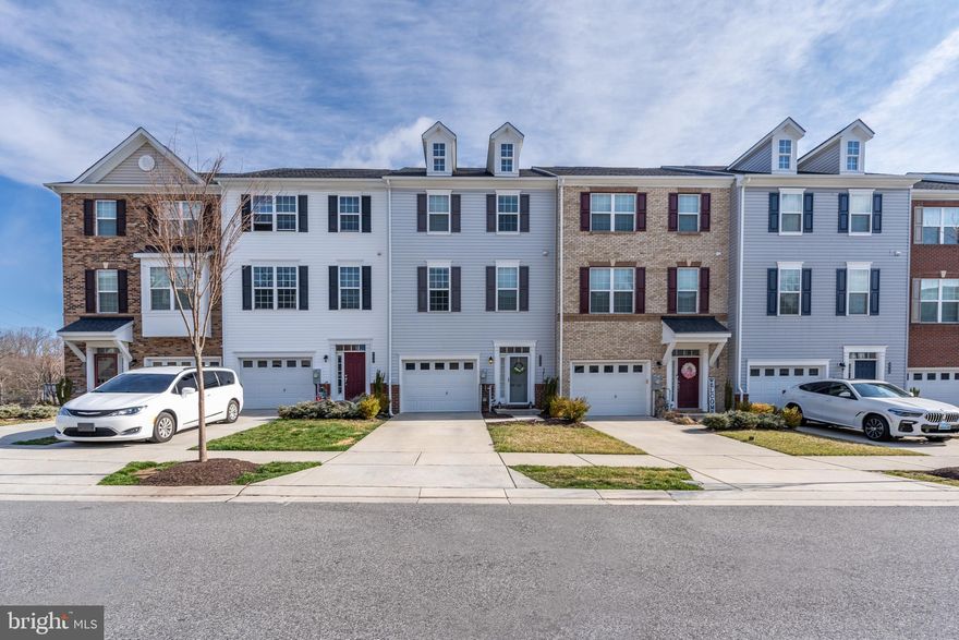 Welcome to this stunning 2018 townhome that boasts a rare bump out on each level, providing spaciousness and natural light throughout the entire home. With 4 bedrooms, 3 full and 1/2 baths, this home offers ample living space for families and professionals alike.  As you enter the main level you will immediately appreciate the open floor plan, which seamlessly connects the living room, dining area, and kitchen. The modern kitchen is equipped with stainless steel appliances, granite countertops, and a breakfast bar. There is also an additional space that can be used for an office or sitting area. This room opens to a lovely deck and outdoor space. 
The upper level of this home features a luxurious owner's suite that boasts a walk-in closet, a private bathroom with double vanities, and a tiled shower. Two additional bedrooms, a full bath, and a laundry room with side by side full sized washer and dryer. The lower level of this home is a rare find with another bedroom with its own full bath and walk in closets. This makes for an ideal in-law suite, private space for a roommate. Plenty of possibilities!!  Located in a wonderful location, your new home is close to shopping, dining, and entertainment options. It is also conveniently located near major highways, making it an easy commute to Baltimore and the surrounding areas. Don't miss out on the opportunity to make this stunning townhome your new home!