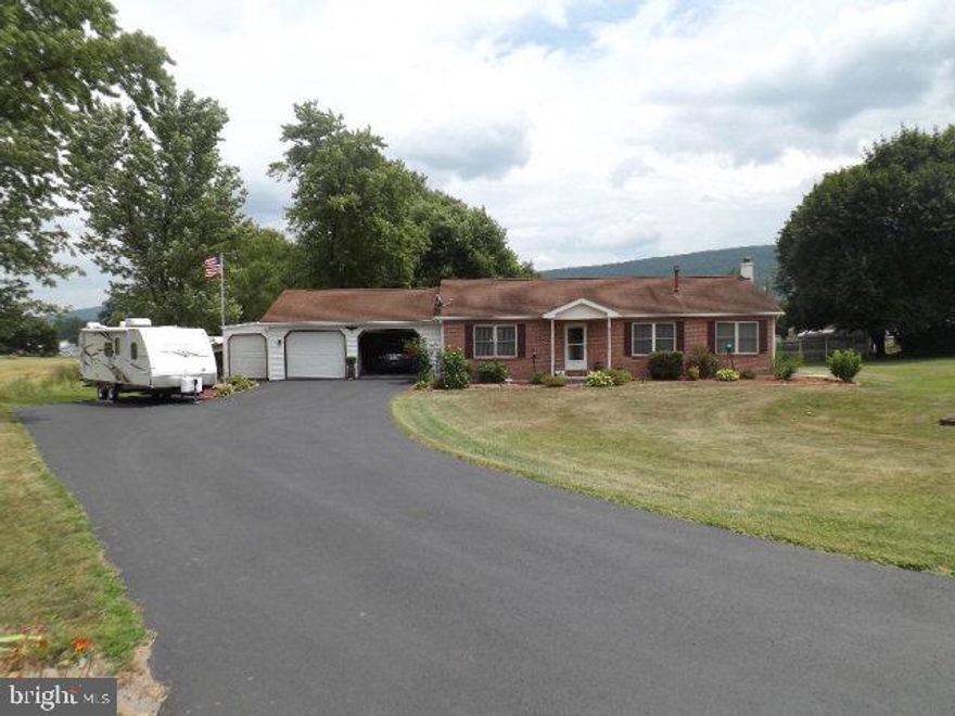 Don't miss your chance at this Beautiful well-kept 3 bed, 2 Bath brick and vinyl sided ranch home that is move-in ready. Outside enjoy mature landscaping, park your RV and hook-up, enjoy your evenings on your deck or 20X20 covered Patio w/electric.  Inside enjoy the open kitchen, dining and living room all updated with beautiful finishes. Large master has his/her closets and a master bath with a new tub/shower and large linen closet. On the other side of the home you have your other two bedrooms and bath. Nice basement workshop and rec room.