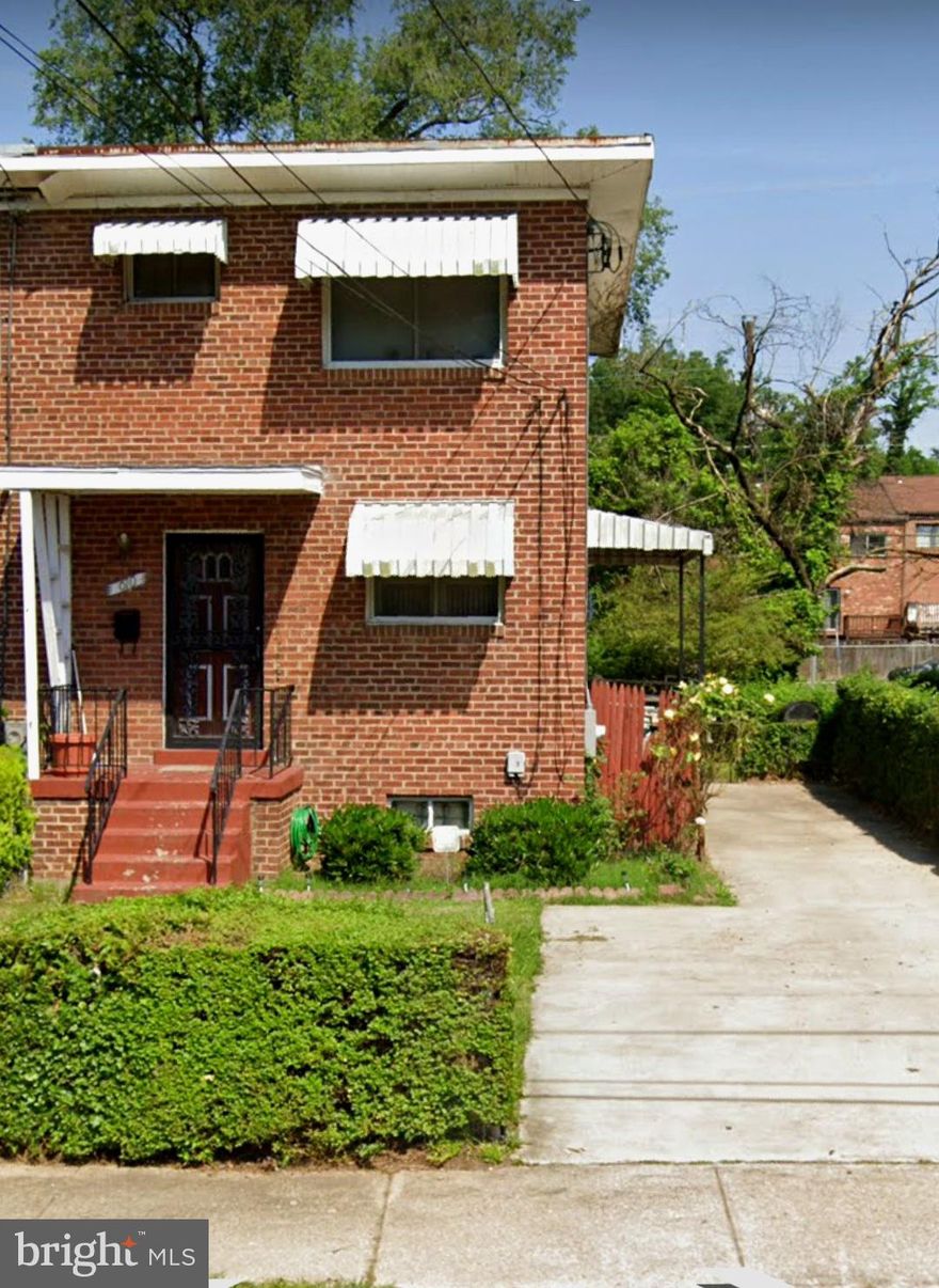 Estate Sale Sold As Is and Won't Last Long!

This semi-detached ALL brick, 3 level, 2 bedroom, 1.5 bath townhome has strong bones, great potential and with a little TLC, it could become someone's forever home! An investor's delight, this property is less than 5 miles from VA, walking distance from DC, and minutes from The National Harbor!

This home features a fenced in 3 car driveway, and a  nice size, private, flat backyard with shed. There are 2 porches... one on front and the other on the side of home. There are also 3  ways to access the property.  As you enter the basement, you walk into an open space great for entertaining which includes a wet bar! There are  2 large closets for storage, a half bath and a separate laundry room with a full size washer and dryer, double utility sink, and plenty of shelving for more storage. 

Upon entering the front door on the the main level, there is a coat closet on the left for more storage and as you proceed down the foyer and turn to the the right, you enter into the kitchen which has a door that accesses the side private porch. The dining area and family room have 2 huge windows for natural lighting and to add there are hardwood floors underneath carpet throughout the main level and upper level.

The upper level boasts a full size bath/shower (upgraded in 2009), 2 bedrooms and a linen closet. The primary bedroom which  is nice in size, has a large window that overlooks the secluded backyard, a walk-in closet, and a ceiling fan with lights. The second bedroom is also good in size. It also has 2 windows that are great for natural light, a ceiling fan with lights, and closet.

Bring your buyers! 
PLEASE TURN OFF ALL LIGHTS AND LEAVE BASEMENT LIGHTS ON <--
The price is firm and low offers will not be accepted.
 New HVAC in 2020, The AC was serviced in 2022, electrical system updated in 2020, washer and dryer serviced in 2021. Seller prefers Cardinal Title LLC- for title processing.