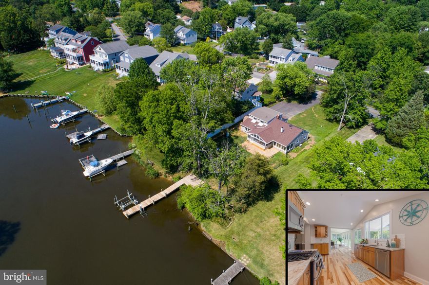 PICTURE PERFECT WATERFRONT HOME IN SOUGHT AFTER LOCH HAVEN! Beautifully updated colonial style home boasts a completely remodeled gourmet kitchen, a main level master suite, and a large screened patio to enjoy breathtaking waterfront views.  Enter to a bright and airy living room with high ceilings and recessed lighting and a gas fireplace as your focal point. Seamless hardwoods lead you to the open concept kitchen and dining area with large picture windows. The gourmet kitchen features custom cabinets, granite counter tops and stainless steel appliances creating the perfect ambiance for entertaining. Through the sliding doors offer access to the magnificent screened porch with custom tile work that highlights a cathedral ceiling with recessed lighting.  Off of the living room is one bedroom, a full bathroom and a laundry area.   Privately located down the hall is a master suite with water views and a completely remodeled ensuite bathroom.  Upstairs you will find two additional large bedrooms with a Jack and Jill bathroom and attic area for storage. Enjoy your own private retreat on large flat landscaped grounds with a massive deck, fenced in back yard and with an electric dock wired for an 8,000 lb boat lift and a jet ski lift.  Huge freshly paved driveway with an oversized one-car garage makes parking a breeze. This home has been completely upgraded and is ready for you to move right in.  Don't miss the opportunity to own your dream waterfront home!  Water privileged community w/ sandy beach, playground, tennis/basketball & volleyball courts, & marina!