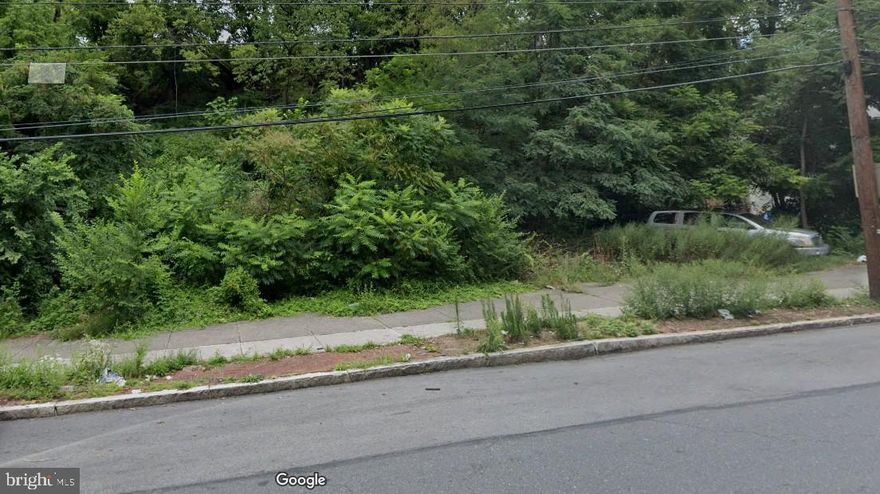 Vacant lot along the busy Market St corridor just off Cameron St.  The lot is zoned Commercial Neighborhood which allows for many residential and commercial uses.