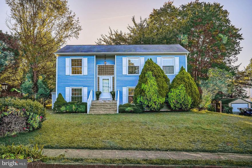 Huge price reduction! Welcome to this beautifully maintained charmer in the highly desirable Warrenton Lakes neighborhood!  Peek-a-boo views of the lake!  Inviting entry opens to light-filled spaces.  Upstairs, find the seamlessly connected living room, dining room, and updated kitchen (stainless steel appliances, updated cabinets and countertop, backsplash).  Completing the upper level are the primary bedroom, two other bedrooms, and a renovated full bath.  The lower level is fully above-grade and boasts a huge family/play/entertaining area as well as the fourth bedroom and a full bath.  A laundry room and versatile storage room complete this level.  The updated patio door walks out to a relaxing fenced back yard oasis with deck, a gorgeous cherry tree and lots of level space for play.  Large shed is water tight and conveys in "as is" condition.  Home is located on a quiet cul-de-sac, but close to commuter route, restaurants, and shopping.  Make this lovely home a "must see" on your list!