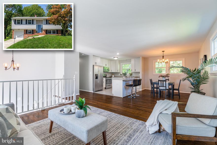 BEAUTIFUL NEW RENOVATION! Enter into a bright and airy open-concept living, dining, and kitchen area with beautifully refinished hardwood flooring running throughout.  The kitchen is brand new and has been designed with custom white cabinetry, granite counter tops and stainless steel appliances.  Upstairs you will find three generously sized bedrooms and a full remodeled bathroom.  In the lower level you will find an additional large living area with electric fireplace, a fourth bedroom, and another full remodeled bathroom.  Outside you will be able to enjoy a large flat and private back yard.  Many updates have been made to this home making it ready for you to move right into.  House is vacant and easy to show so schedule your showing today!