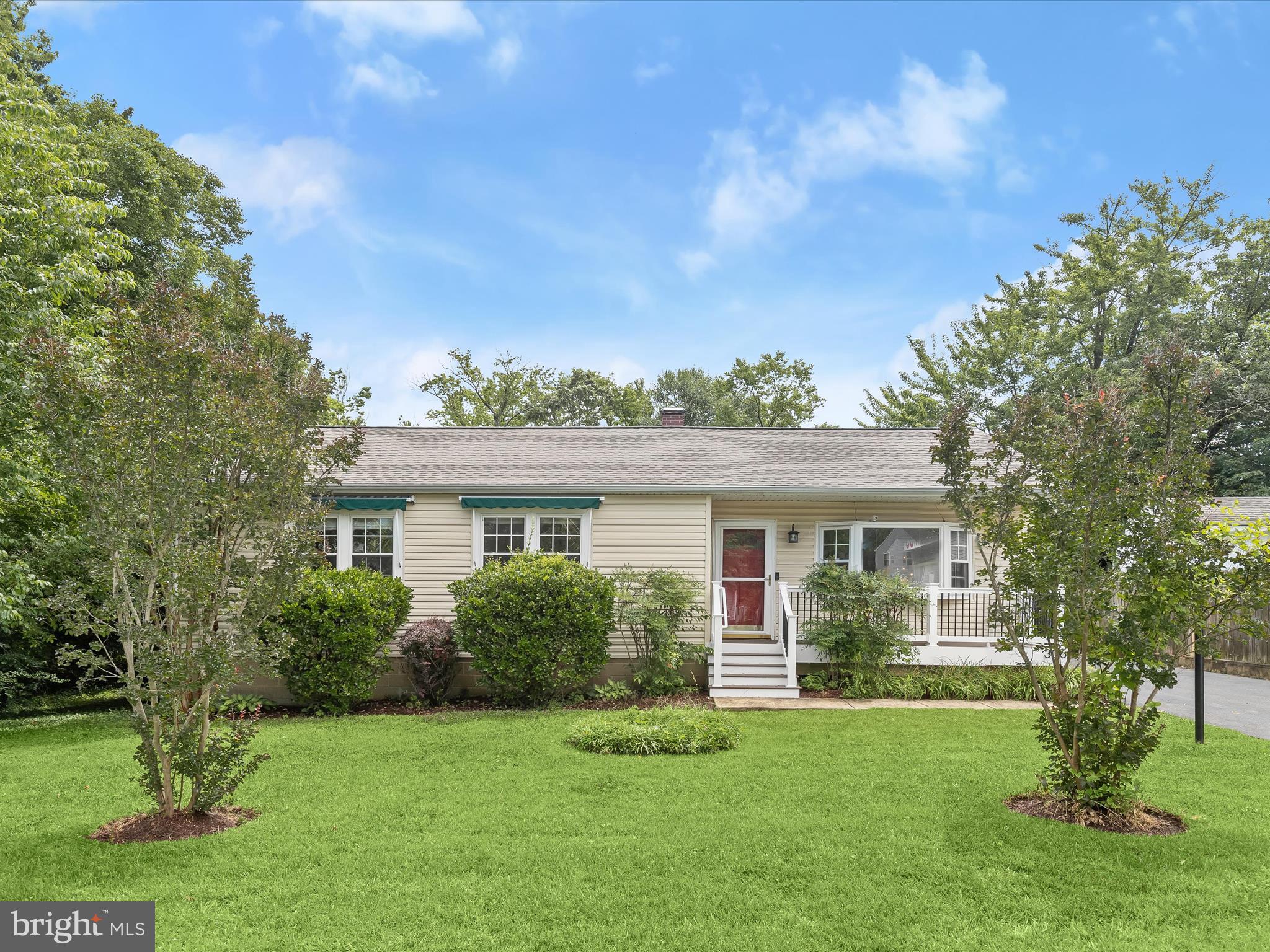 Located in the charming Beverley Beach community, this delightful ranch-style home offers a perfect blend of comfort and functionality. With 1,722 sq. ft. of thoughtfully designed space, this residence features three inviting bedrooms and two full updated bathrooms. Step inside to discover a warm and welcoming interior, highlighted by beautiful hardwood floors and an open floor plan that seamlessly connects the living and dining areas. The country-style kitchen is a chef's dream, complete with brand new granite countertops, updated appliances, and a cozy eat-in area, perfect for casual meals or entertaining guests. Enjoy the beautiful primary suite with views of the backyard and brand new carpeting and a primary bath that adds a touch of luxury to your daily routine with its spa tub and large standing shower. Two additional bedrooms offer space for guests or a home office easily. Laundry is also conveniently located on this level. Outside, the property boasts a generous 0.23-acre fenced lot with beautifully landscaped front and rear yards, providing a serene backdrop for outdoor gatherings. Relax on the spacious deck where you can soak in the peaceful garden views. The two car detached garage is large and can store your boats, paddle boards, beach gear or additional cars and ample driveway parking ensure that you have plenty of space for parking. Located just four blocks from the stunning Chesapeake Bay, this home offers easy access to water activities and scenic walks along the beach. The community amenities, including jogging paths and picnic areas, enhance the lifestyle of this inviting neighborhood. Experience the perfect blend of comfort, convenience, and coastal charm in this lovely home. Available for tours starting July 10! OPEN HOUSE JULY 12 and JULY 13 1-3PM!