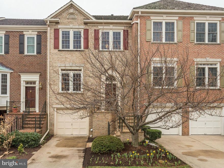 Walk to Starbucks from elegant 3-level TH w/2-level fenced decks; backs to common area! Granite & stainless appliances in kitchen, & over-sized island/breakfast bar opens to separate dining room. MBR suite w/ vaulted ceilings, dual vanity, soaking tub & separate shower!  Walk-out lower level offers full bath, separate laundry room & rec room w/fireplace!  Quiet!  NOT situated on Columbia Pike!