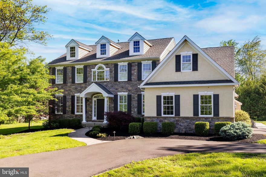 $50K PRICE IMPROVEMENT on this thoughtfully built Colonial Farmhouse Tucked away on 1.18 level acres in Lower Gwynedd Township.  This property and home offer space, style, and a sense of privacy that’s increasingly hard to find. Just 12 years young, the home combines the look of timeless architecture with the comfort of modern construction—and a layout that lives beautifully and securely every day--especially with the whole house generator. The long drive and roundabout entry offer more than just curb appeal—they create a true feeling of arrival and welcome. There’s plenty of parking for guests, and with professional landscaping and landscape lighting, the property feels (and is) private. If you're someone who prefers a little distance from your neighbors, you’ll appreciate the setting. Inside, the home features over 4,400 square feet of living space, including a finished basement  was completed in 2016. The first floor is filled with natural light and warmth, grounded by hardwood flooring and designed with easy flow between the kitchen, family room, and outdoor living spaces. The kitchen features custom cabinetry, a generous center island, Carrera marble countertops, and designer lighting—elevated but never overdone. Formal living and dining rooms add flexibility, and a quiet home office is perfect for those who work remotely or simply need a peaceful corner. Upstairs, the owner’s suite offers a restful retreat with a large, 19' x 10'  walk-in closet, a sitting room (currently used as a second office), and a spa-like bath with marble finishes and a walk-in shower. Three additional bedrooms share a bright, neutral hall bath. The finished basement (with 9' ceilings) adds room to spread out, with space for recreation, workouts, hobbies, or all of the above—plus extra storage, of course. With low taxes (yes, really), top-ranked Wissahickon schools, and easy access to shopping, dining, and multiple private school options, this home offers something special: space to breathe, style you’ll love, and privacy that’s hard to come by. Come see for yourself.