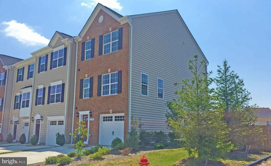 This NEW construction townhome is ready for move-in NOW with 3 finished levels!  Enjoy 42 " Cabinets, Dual Vanities in owners suite with a cathedral ceiling and separate garden tub & shower; a finished rec room, gas cooking, kitchen island, and granite counters. There is hardwood throughout the main level, and miles of serene walking trails in one of Fredericksburg's hottest townhome commuities!