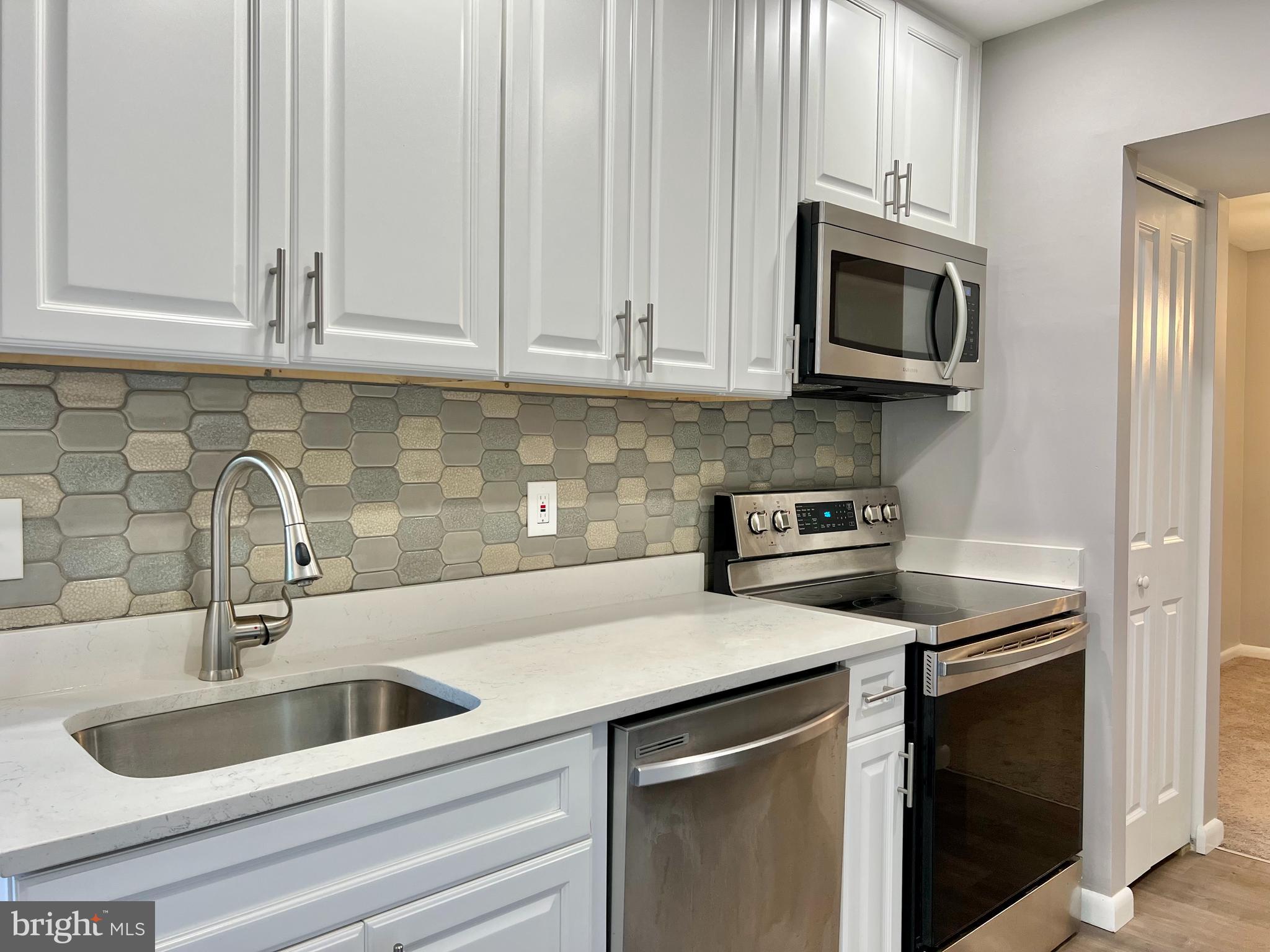 Welcome to 7923 Mandan Rd, Unit 303 – Your Perfect Retreat!
This bright, updated condo offers 3 spacious bedrooms and 2 beautifully renovated bathrooms, all complemented by a stylish designer kitchen ideal for entertaining. Step outside onto your private balcony to enjoy serene views of lush green space, or take advantage of the community amenities, including a sparkling pool, sports courts, picnic areas, and a charming clubhouse.
Additional features include three dedicated parking spaces and pet-friendly policies. Condo fees cover electricity, heating/cooling, water, and sewer for added convenience.
Located in the heart of Greenbelt, you’ll be just steps away from local parks, scenic trails, vibrant community theater, dining, and shopping. Enjoy easy access to top-rated schools, the Metro, and the Beltway, making this a prime spot for both relaxation and convenience.
Come discover why Greenbelt living is so special
PLEASE Provide a summary offer for the property located at 7923 Mandan Road #303, Greenbelt, MD 20770, including the following key details:
•